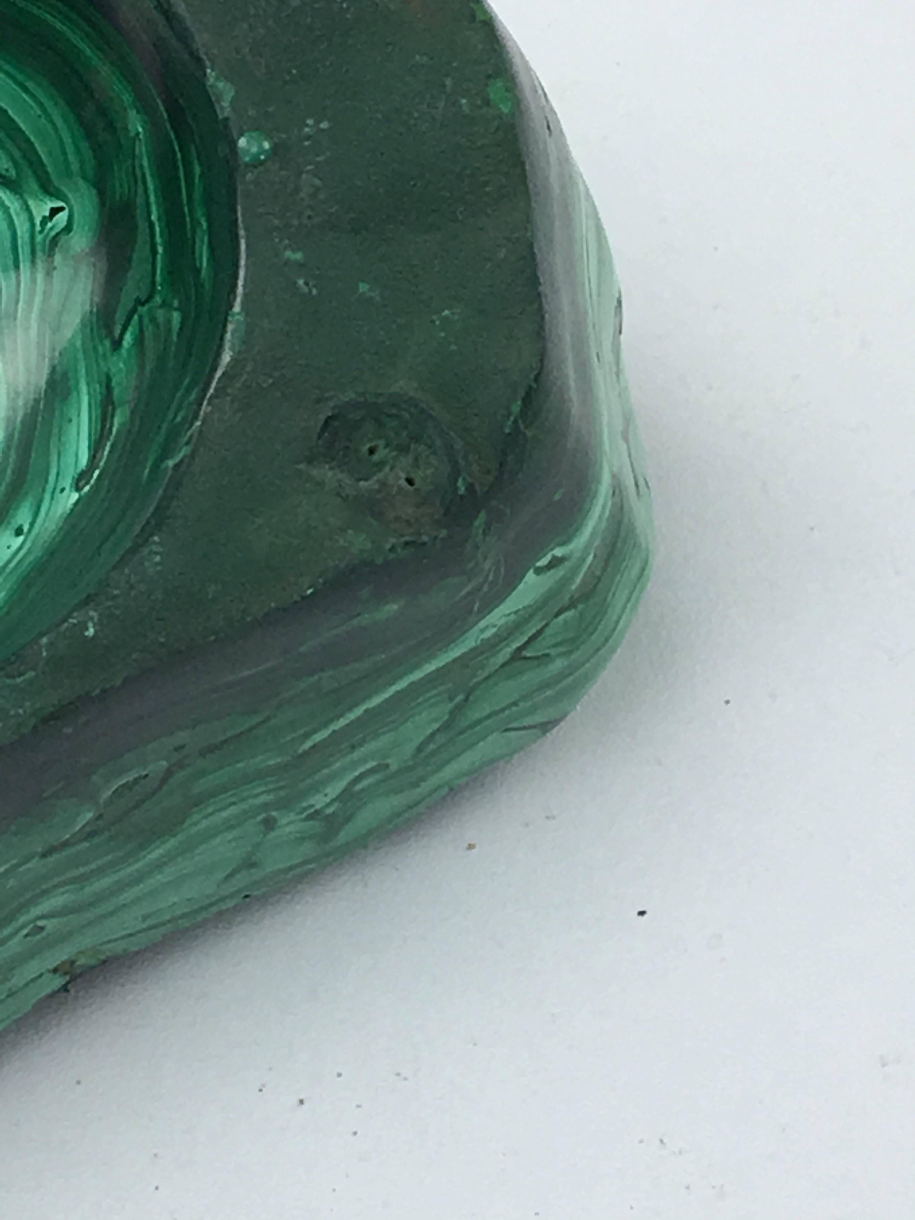 Large malachite ashtray or vide poche. Large size, very heavy; item rare for these reasons.
Natural malachite sculpture.