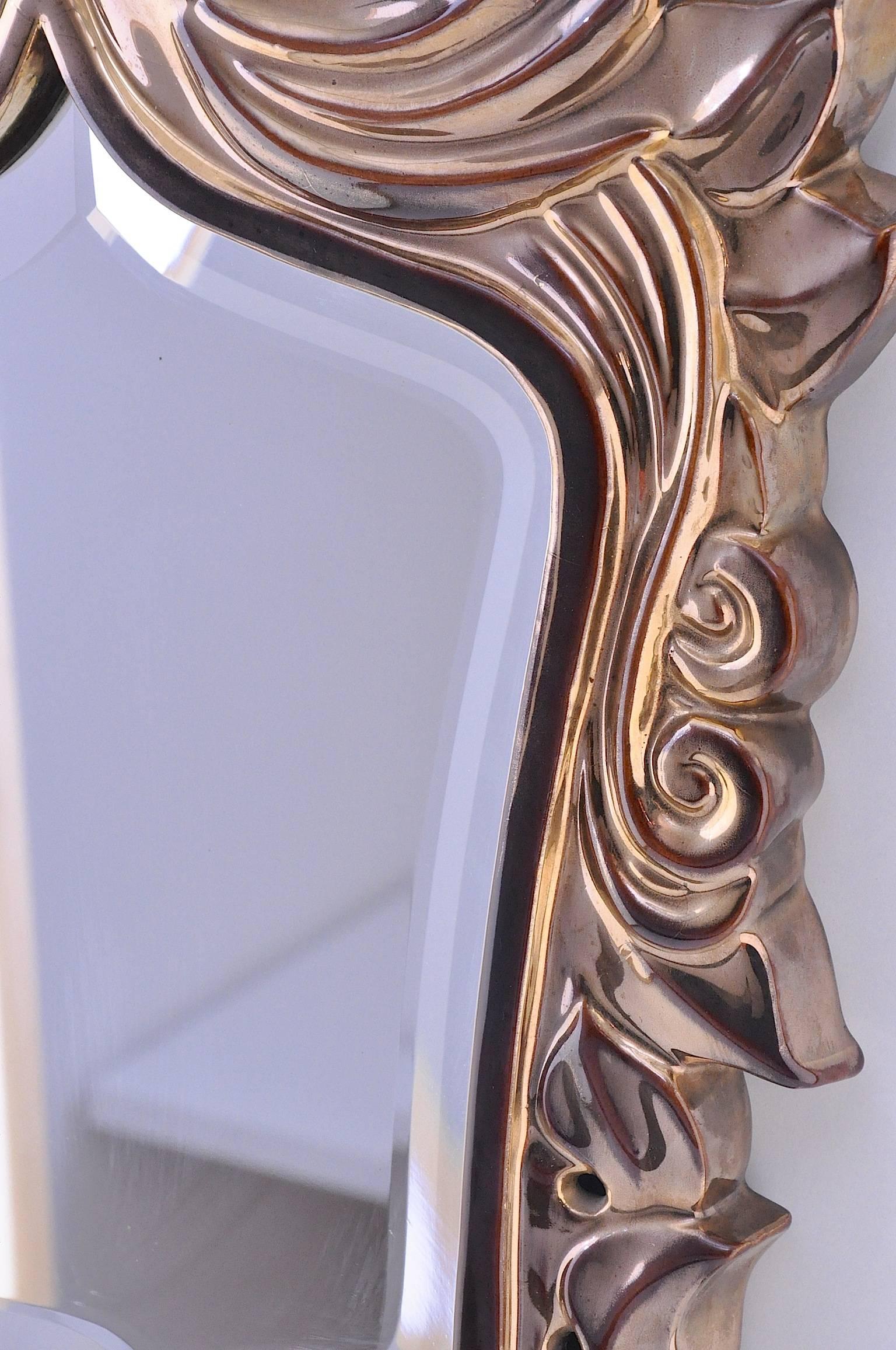 French 1950 ceramic mirror by Giraud.
