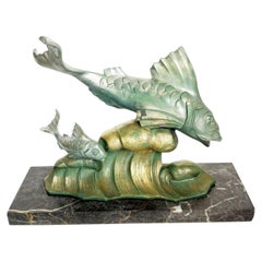 Bronzo e  Scultura in marmo raffigurante un pesce, Francia, anni ’50