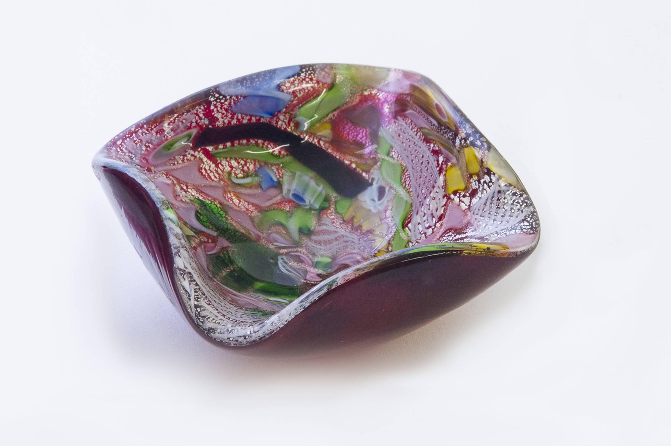 Multi-coloured glass designed by Dino Martens for Aureliano Toso.
handblown Glass Ashtray, i.e. looks different from every side, you will watch it.