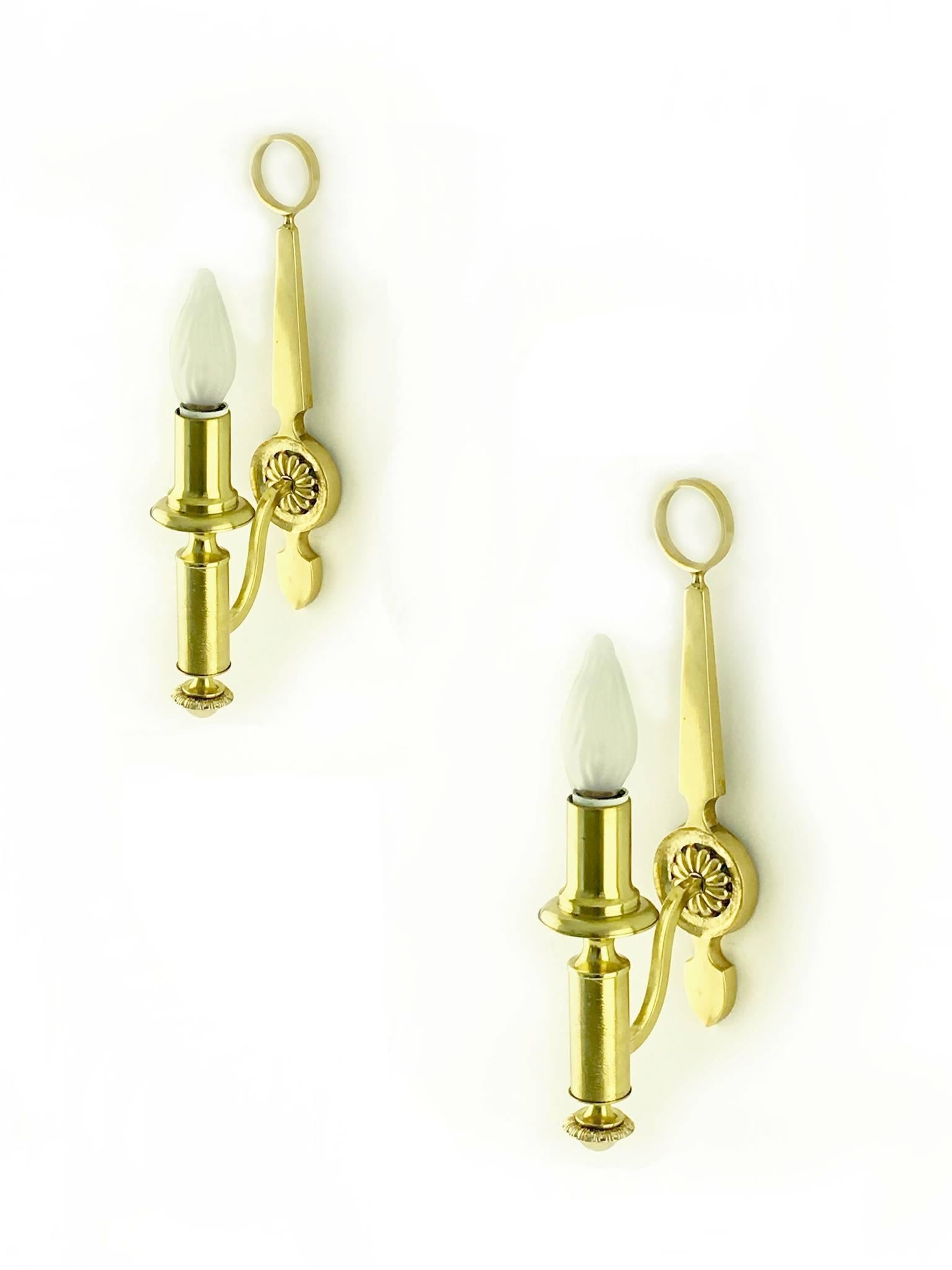 Pair of 1940-1950 neoclassical sconces in the manner of Maxime Old or Jacques Adnet.
SCONCES