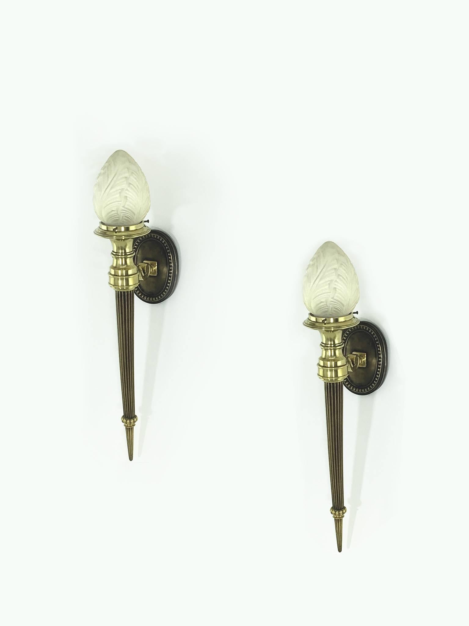 Pair of large high quality neoclassical wall sconces in the style of Rene Lalique or Gilbert Poillerat.
Art Deco Sconces