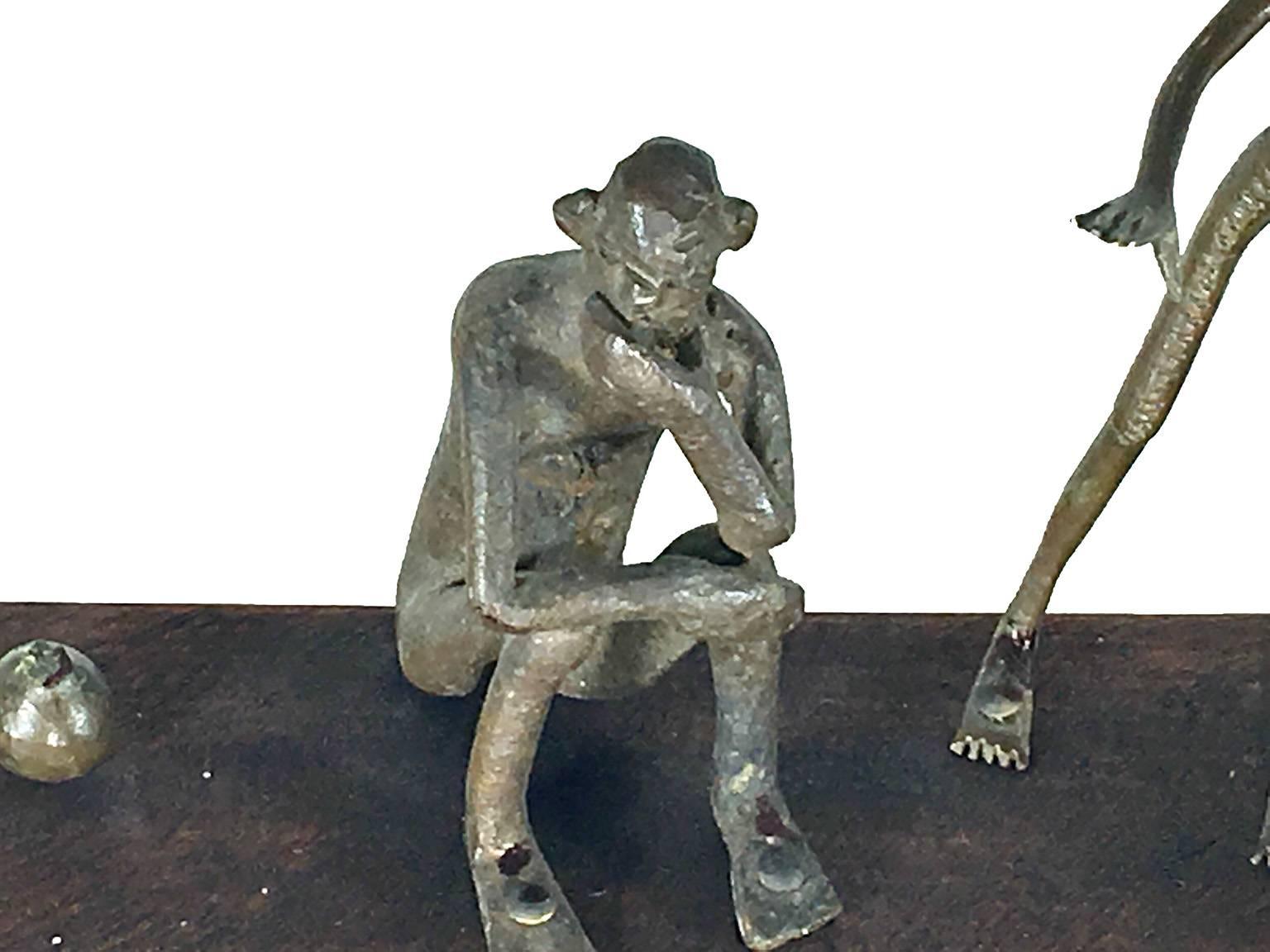 Burkinabe African Bronze Sculpture, with Characters Playing a Game For Sale