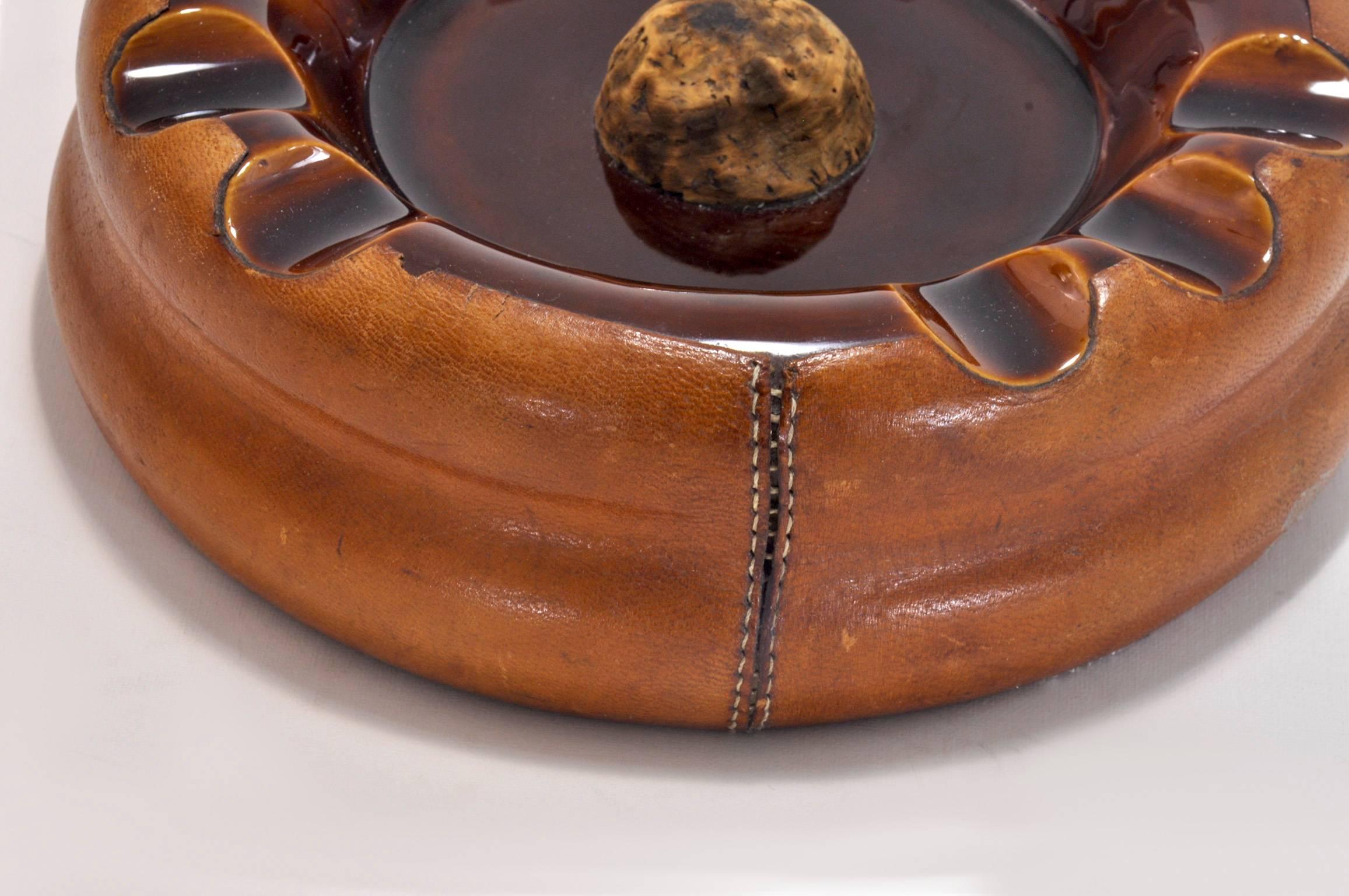 In the style of Jacques Adnet, it can be used as an Ashtray or as, an Decorative bowl too.
