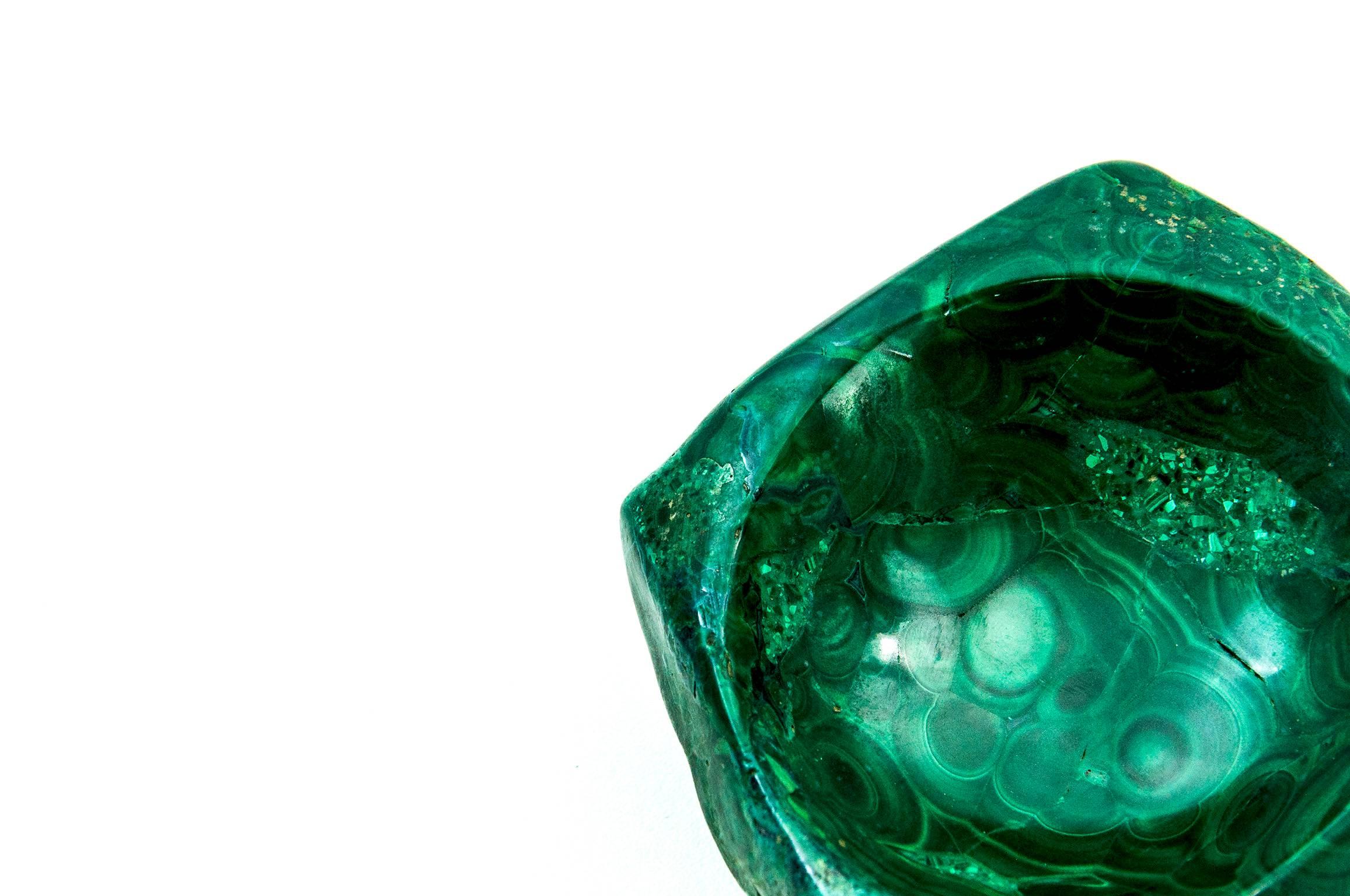 These peace is an decorative object in Malachite. In can be used as an ashtray or a bowl.