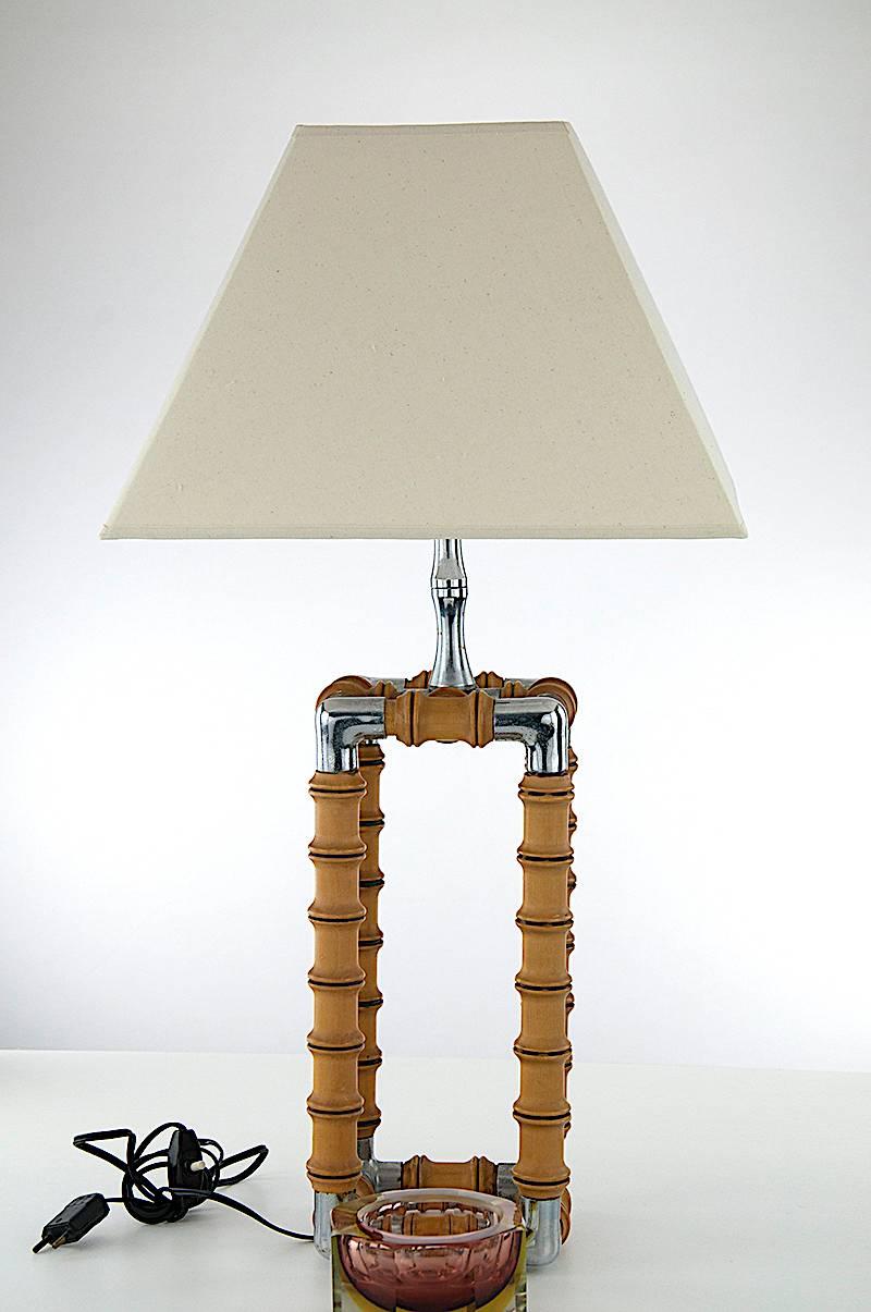 Midcentury faux bamboo french table lamp with fabric shade
chromed.
Dimentions of the shade : 37cm x 37cm x 25 cm.