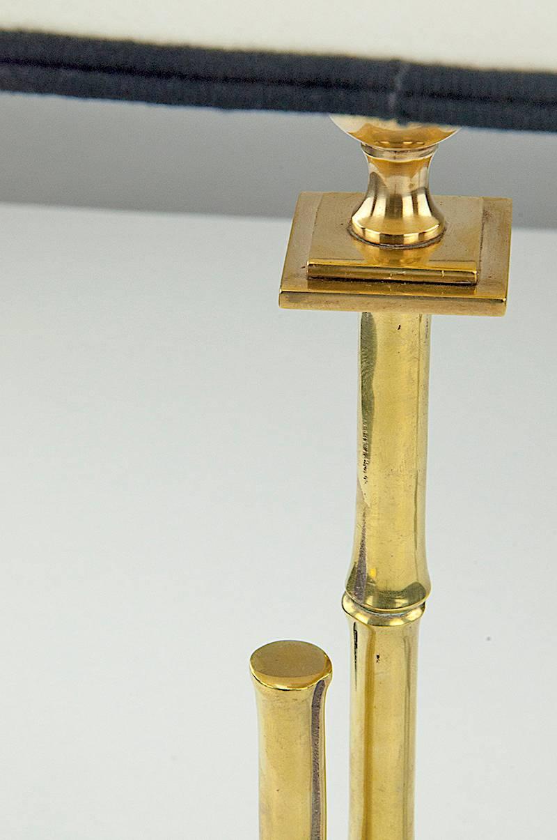 Dimensions of the lamp without shades D 9cm, W 9cm, H 35cm
In the Manner of Jacques Adnet
Classical table lamp
Brass Faux Bambou table lamp, 1960.
 