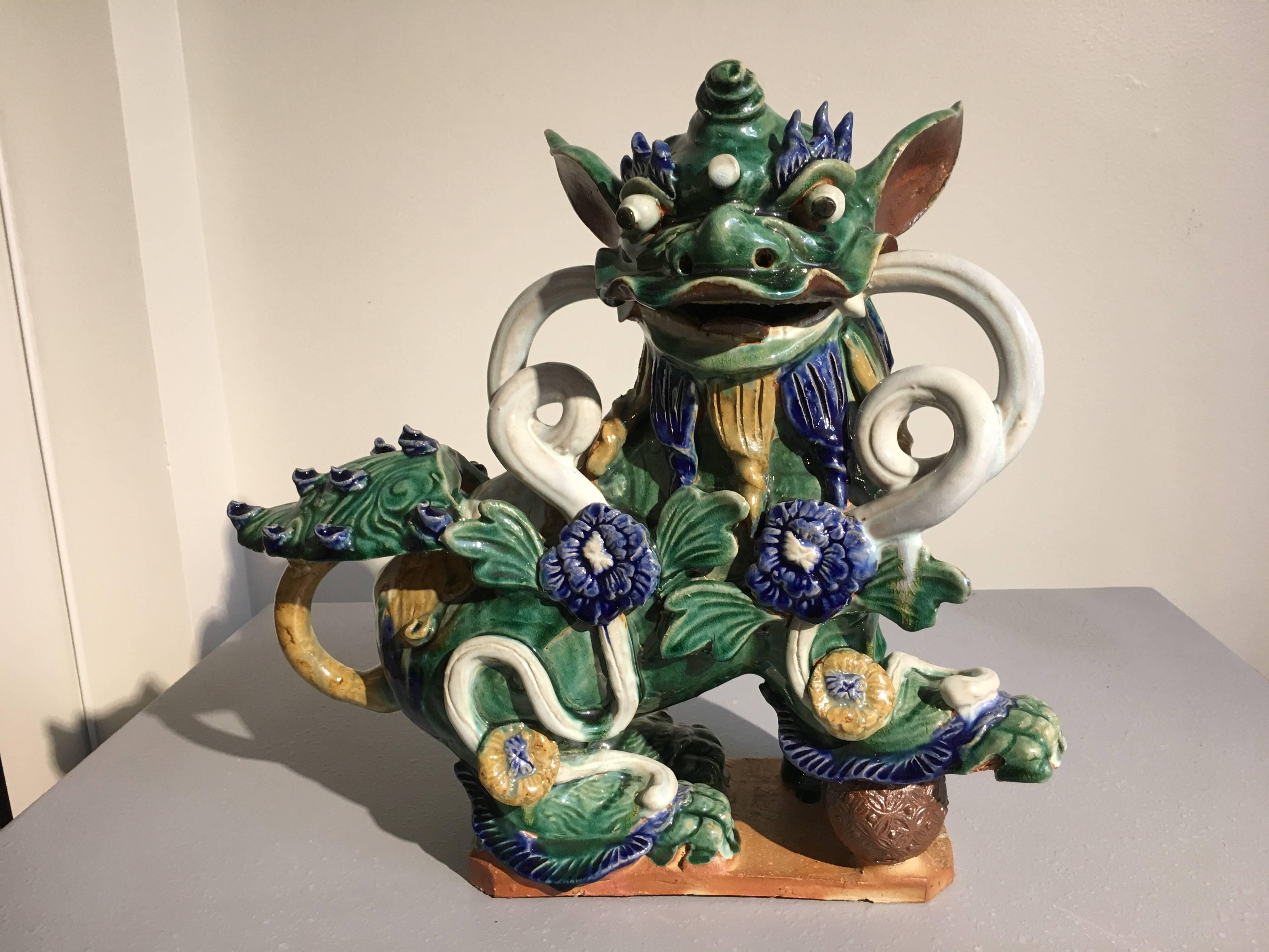 Pair of Chinese Glazed Pottery Foo Dogs In Good Condition In Austin, TX