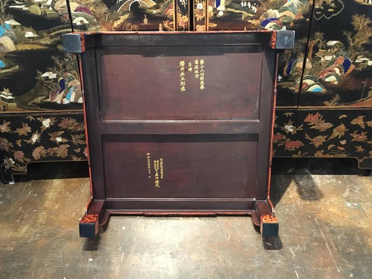 Japanese Negoro Lacquer Low Table with Shishi Design, Dated 1928 at 1stDibs