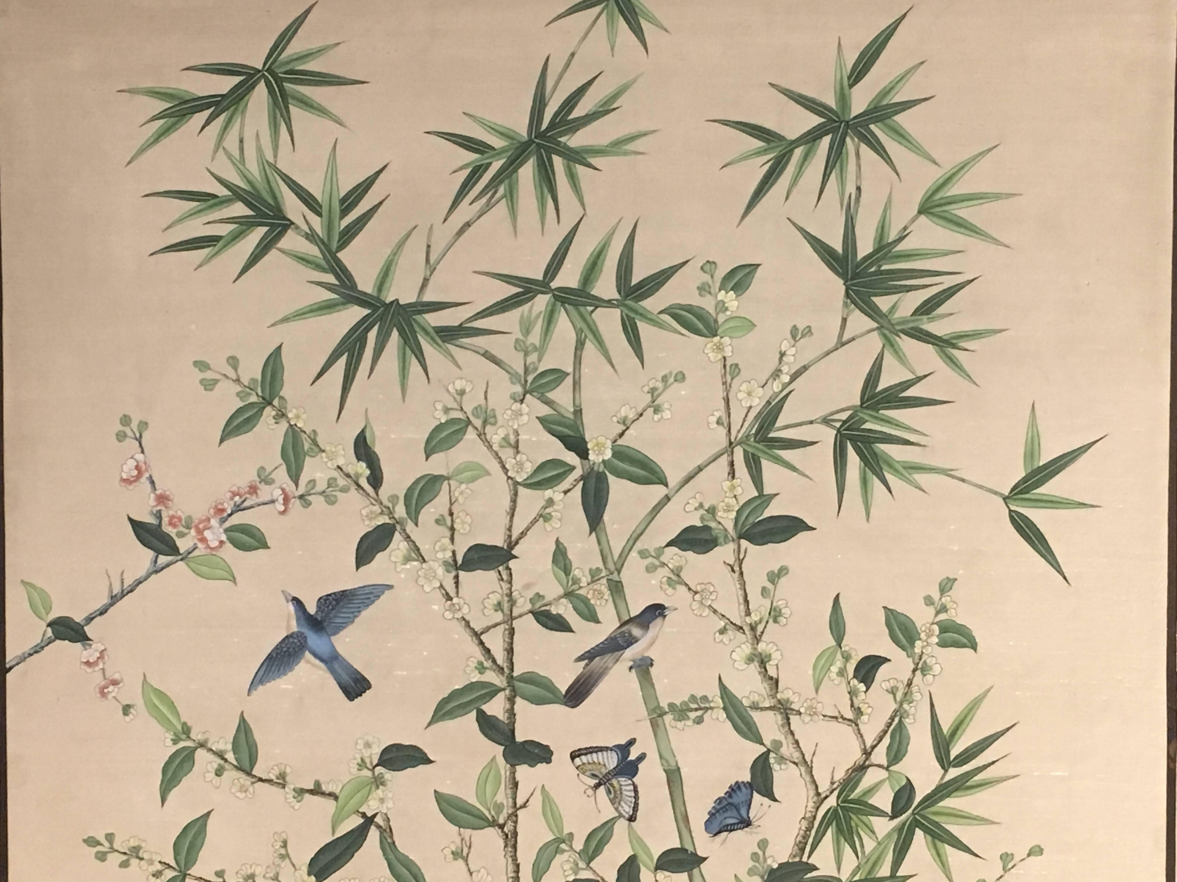 A gorgeous and elegant chinoiserie wallpaper style silk panel hand-painted with a scene of birds and butterflies in a garden setting.
Painted on an ivory silk ground, with rich tones of blue and green and highlights in attractive pink and yellow.
