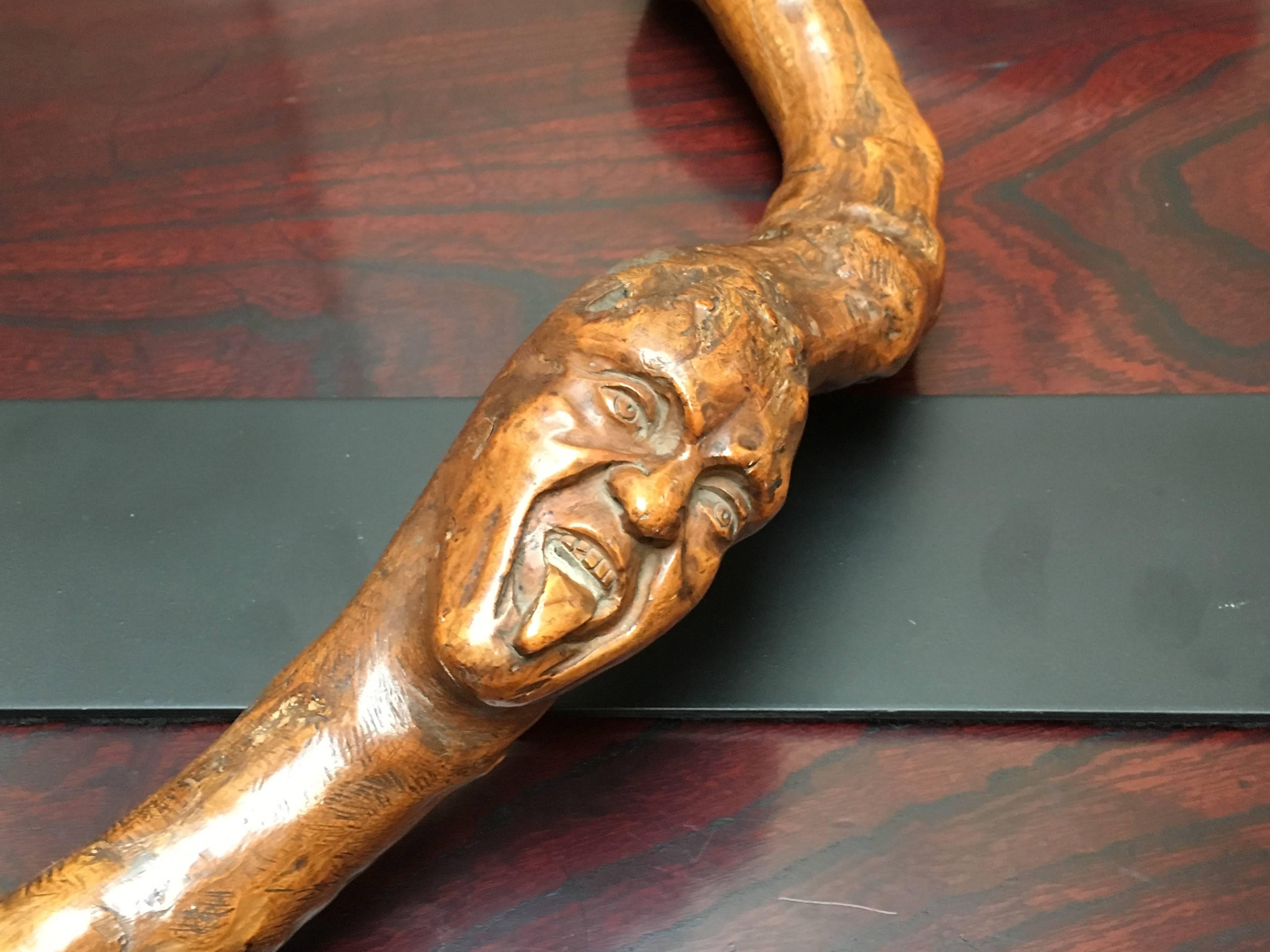 Hand-Carved American Folk Art Snake and Wood Spirits Walking Stick, Early 20th Century