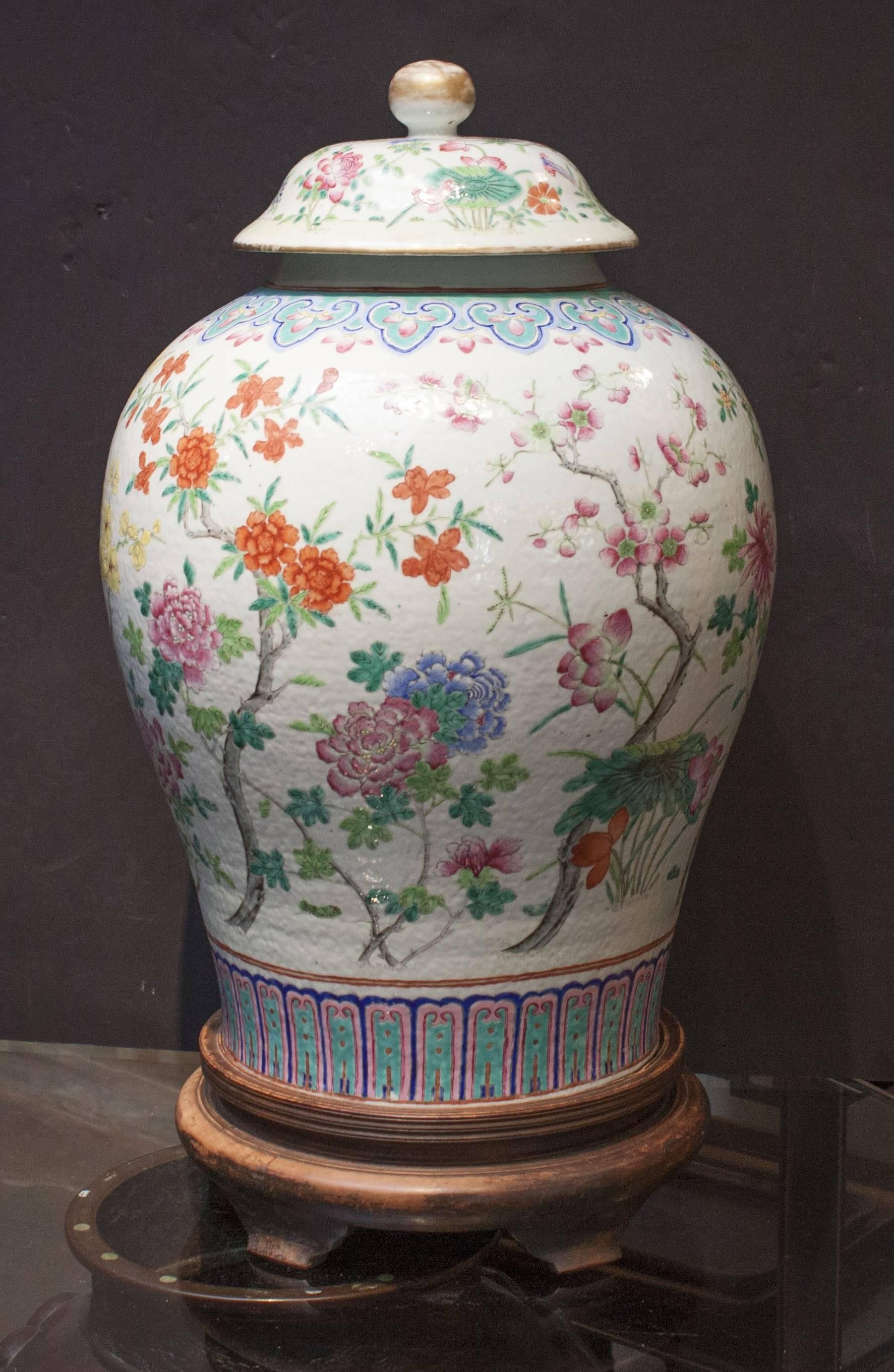 Well potted and beautifully enameled, this baluster jar displays gracious proportions, with a squat neck set on broad, and rounded shoulders that rise beautifully from the body, all set on a recessed foot and surmounted by the original lid. 

The