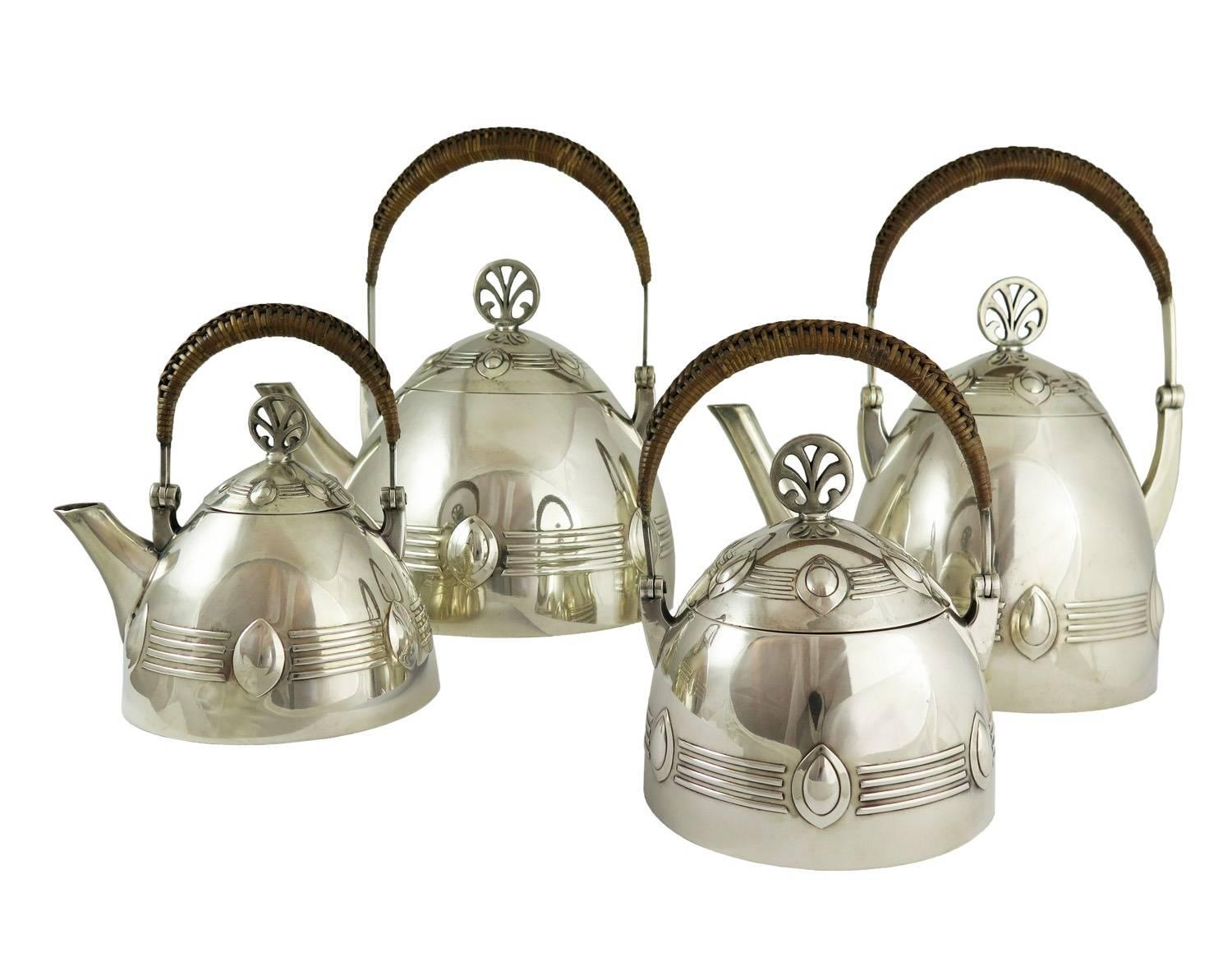 A whimsically refined Jugendstil German silver plate coffee and tea service with tray, designed by Albert Mayer for WMF and retailed by Casa Costa, Argentina.

The Art Nouveau set consists of a coffee pot, tea pot, sugar pot and cream pot, and tray.