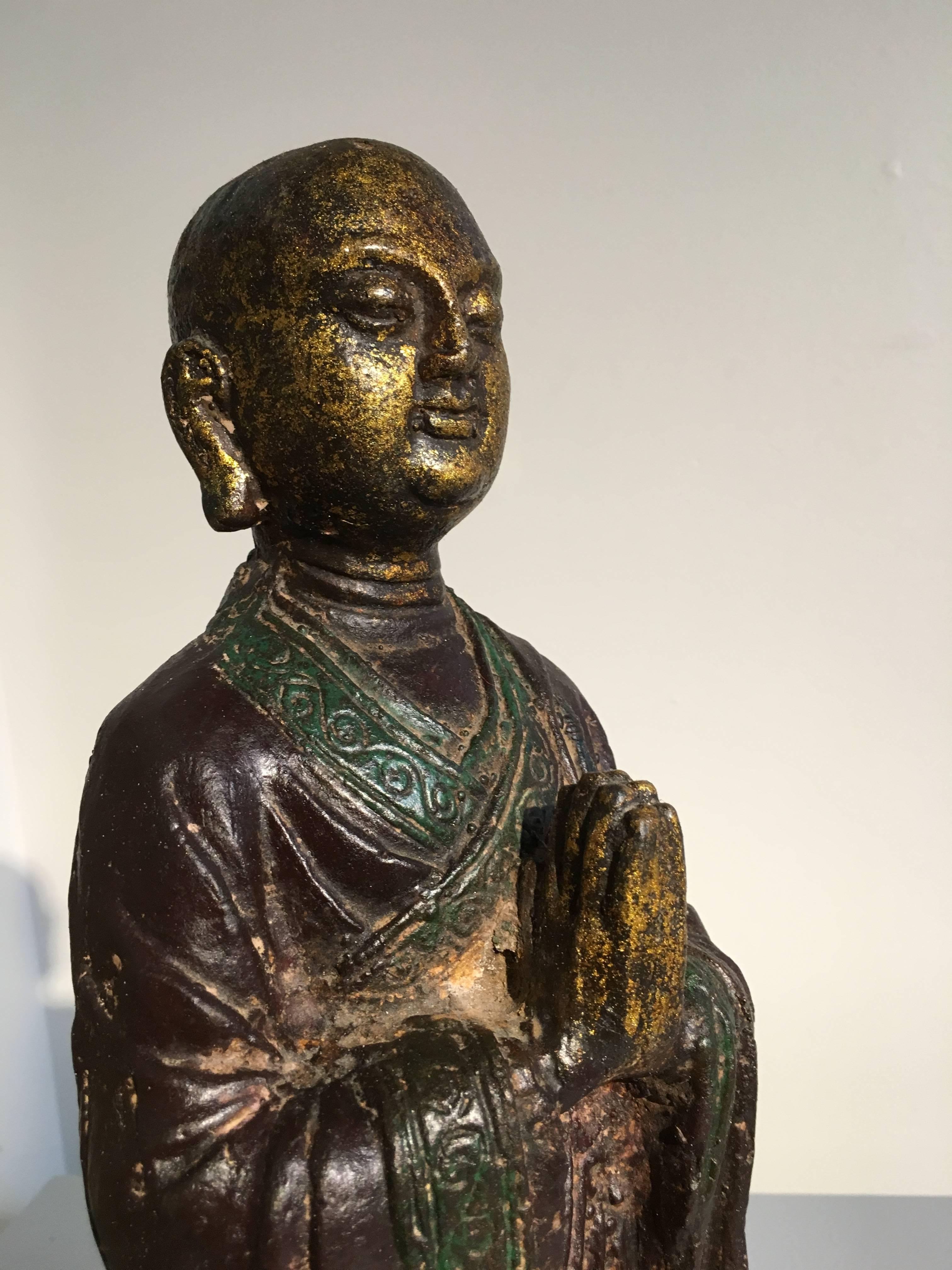 Ming Dynasty Polychrome Lacquer and Gilt Iron Figure of Ananda In Good Condition For Sale In Austin, TX