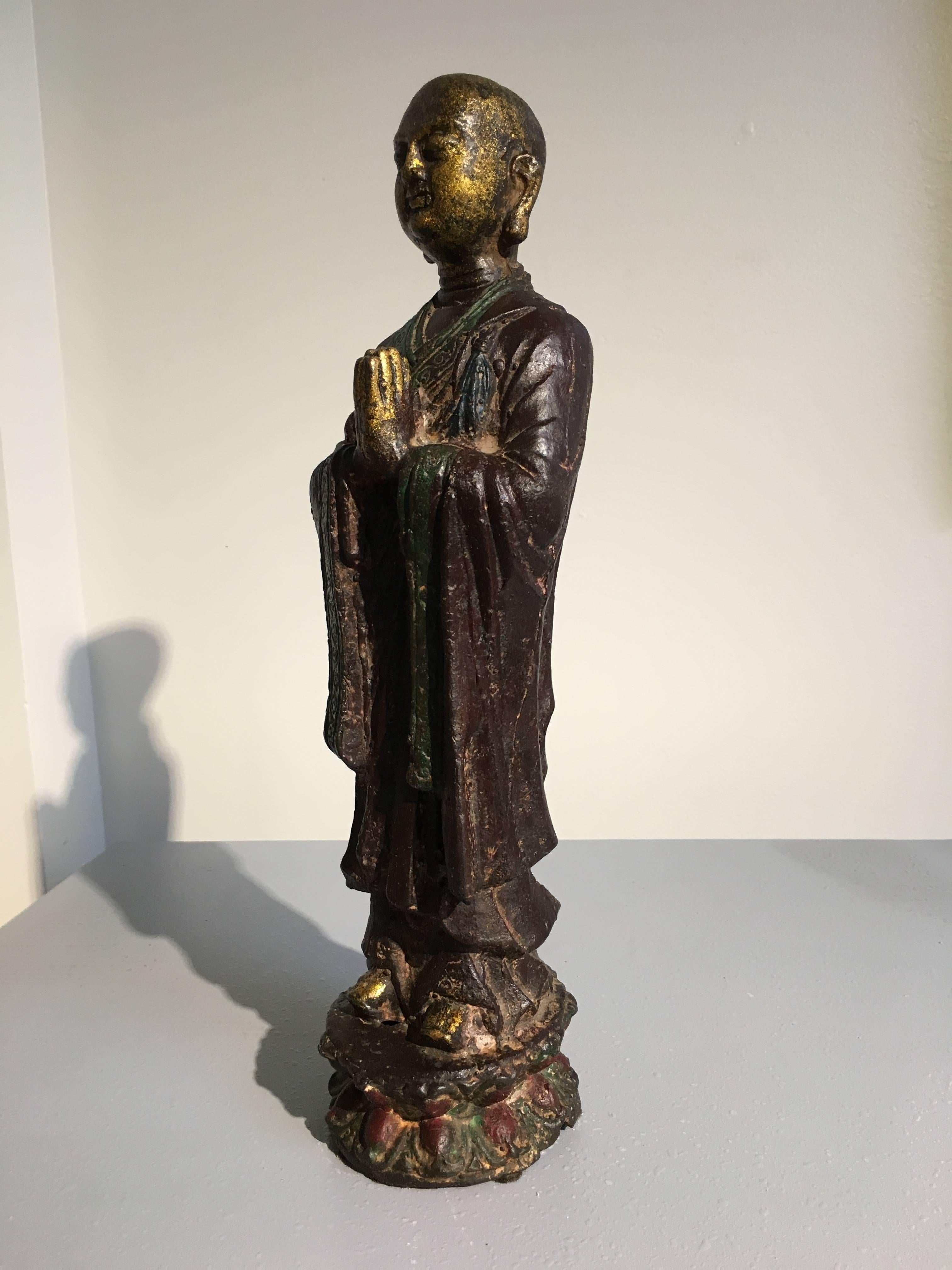 Chinese Ming Dynasty Polychrome Lacquer and Gilt Iron Figure of Ananda For Sale