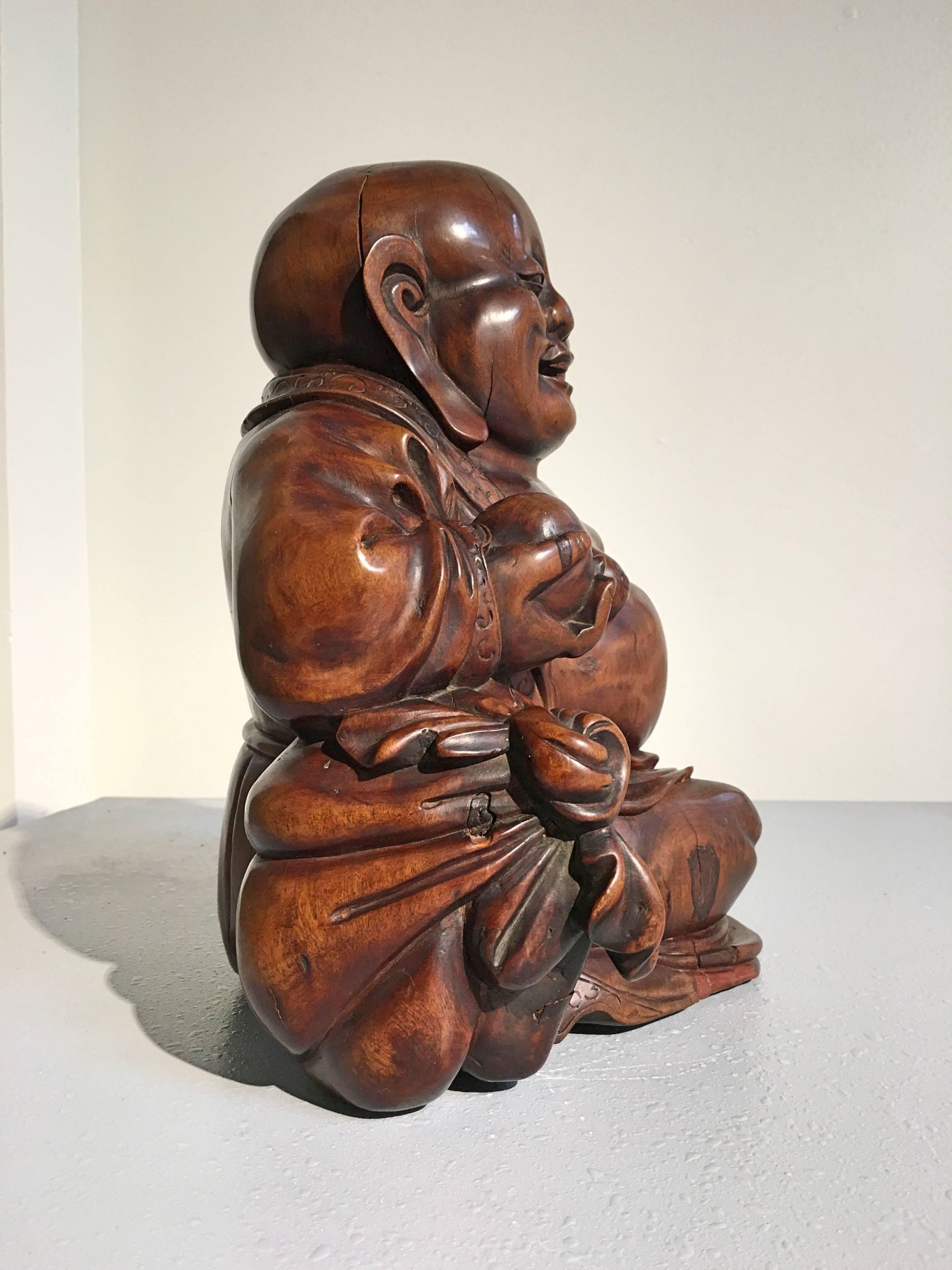 Chinese Carved Hardwood Figure of Budai, Qing Dynasty, Mid 19th Century, China In Fair Condition In Austin, TX