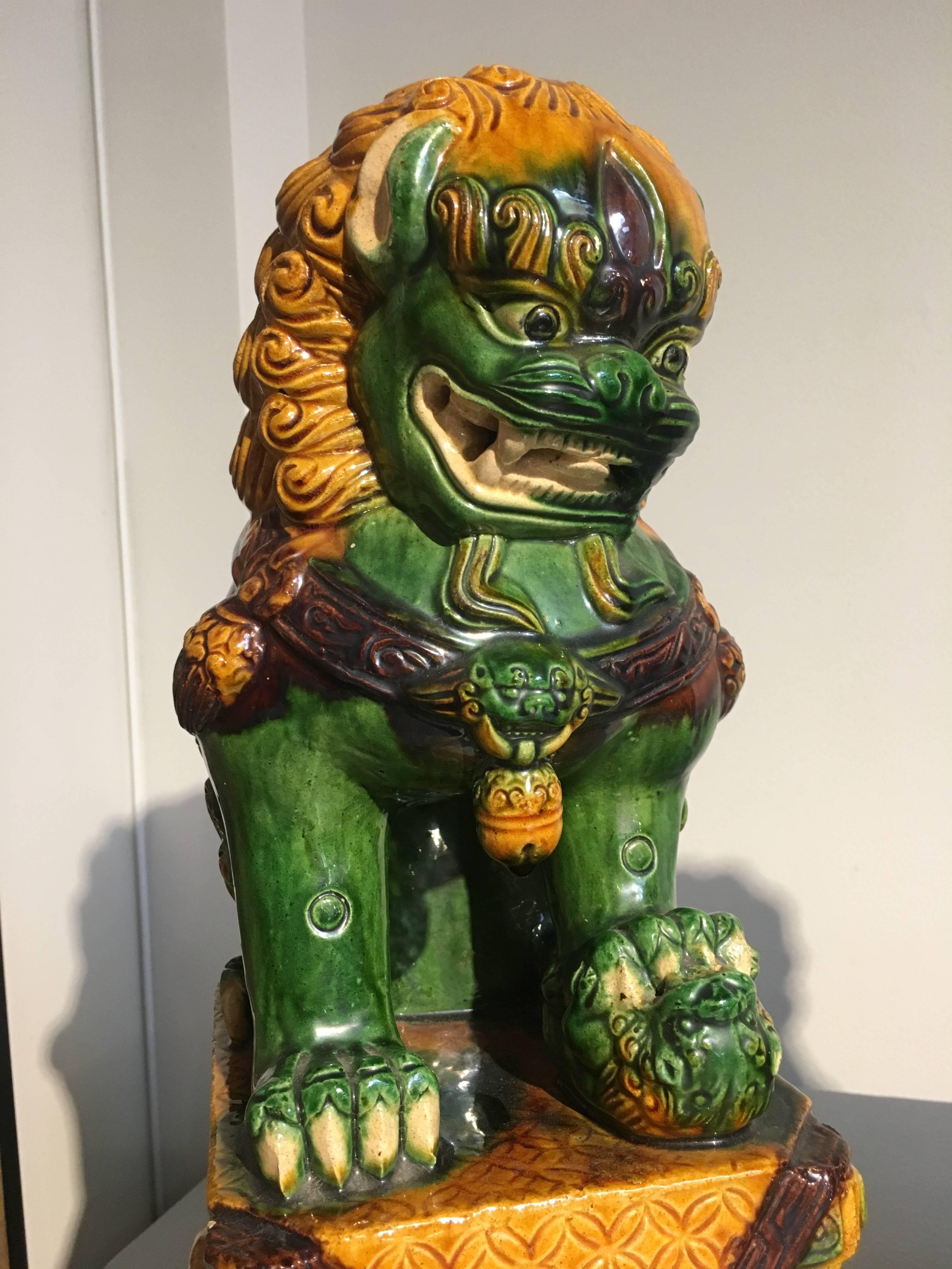 Late 20th Century Pair of Chinese Sancai Glazed Foo Lions