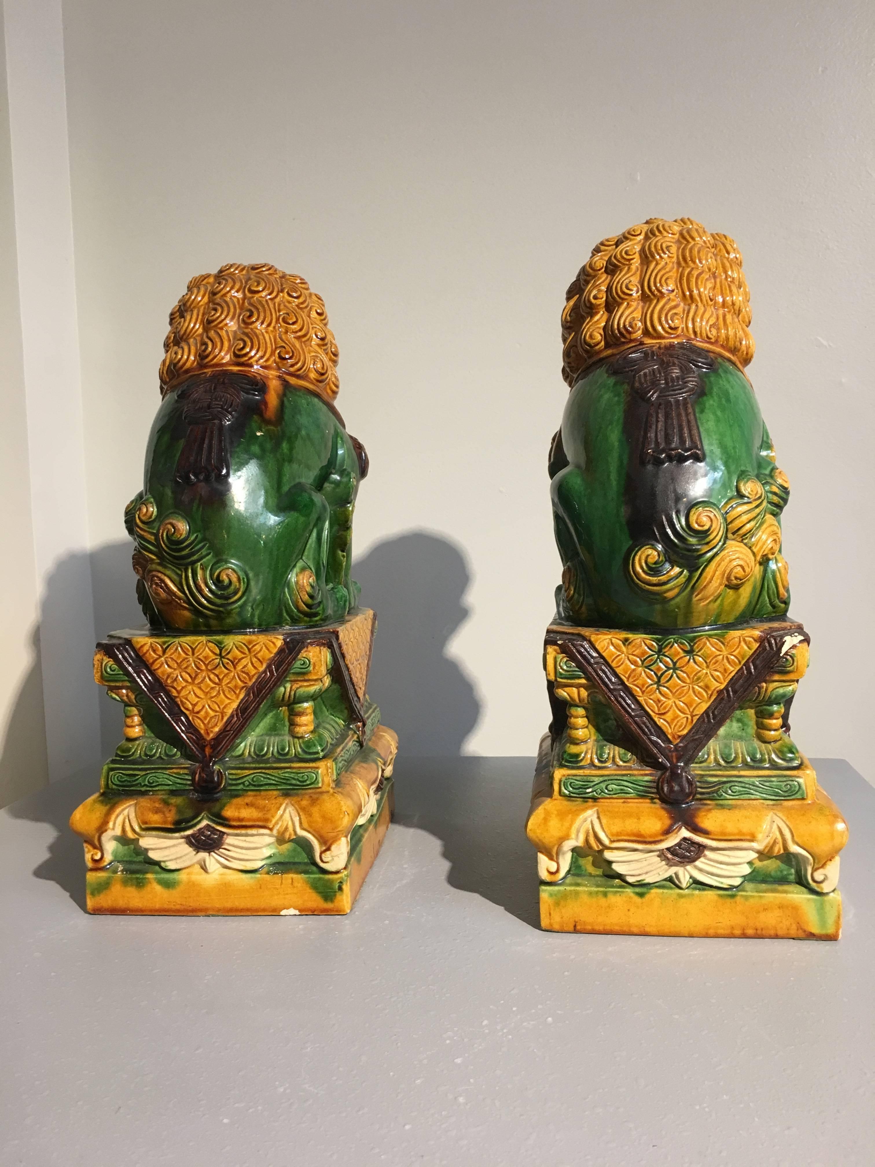 Qing Pair of Chinese Sancai Glazed Foo Lions