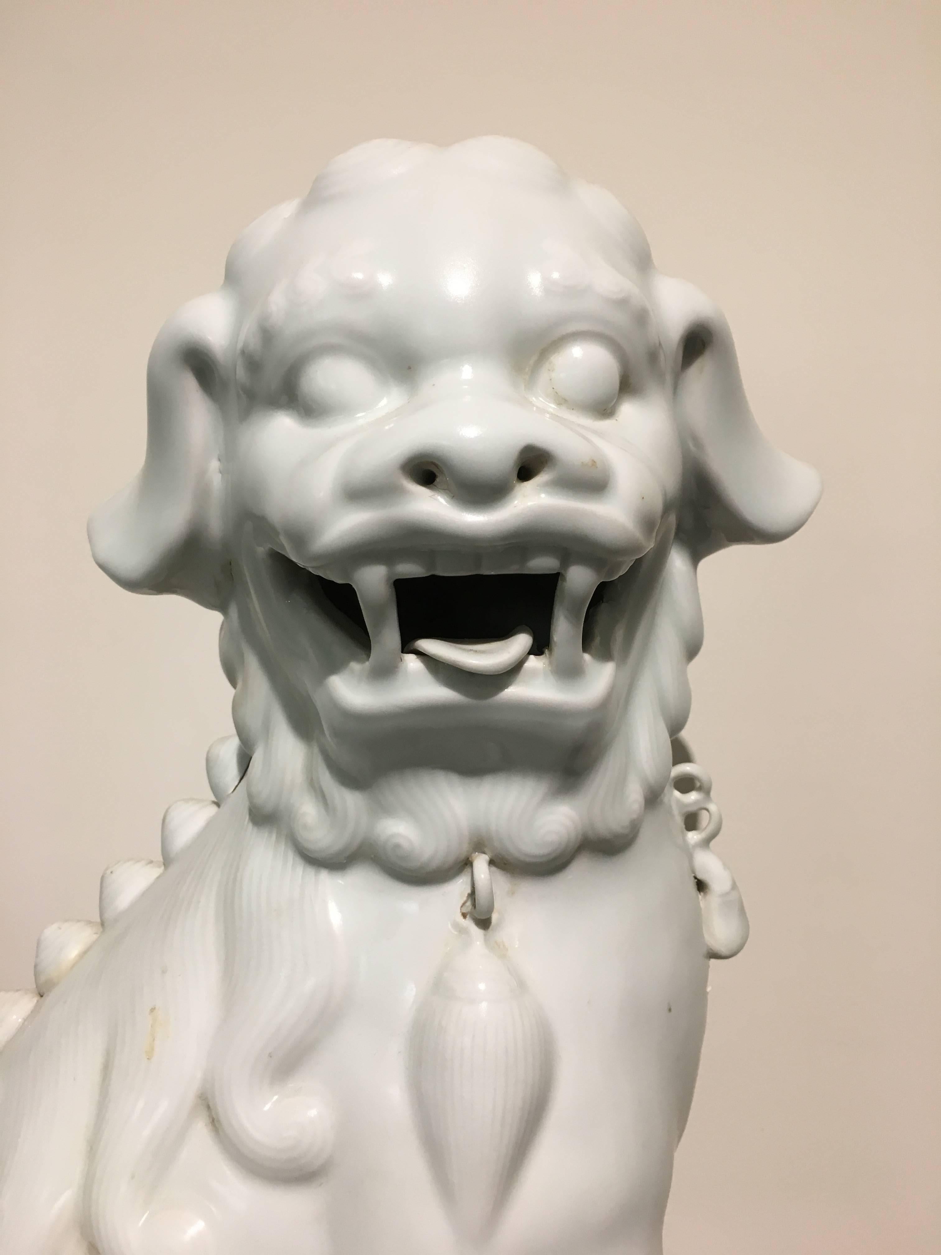 Hollywood Regency Large Pair of Chinese Mid-Century White Glazed Foo Dogs