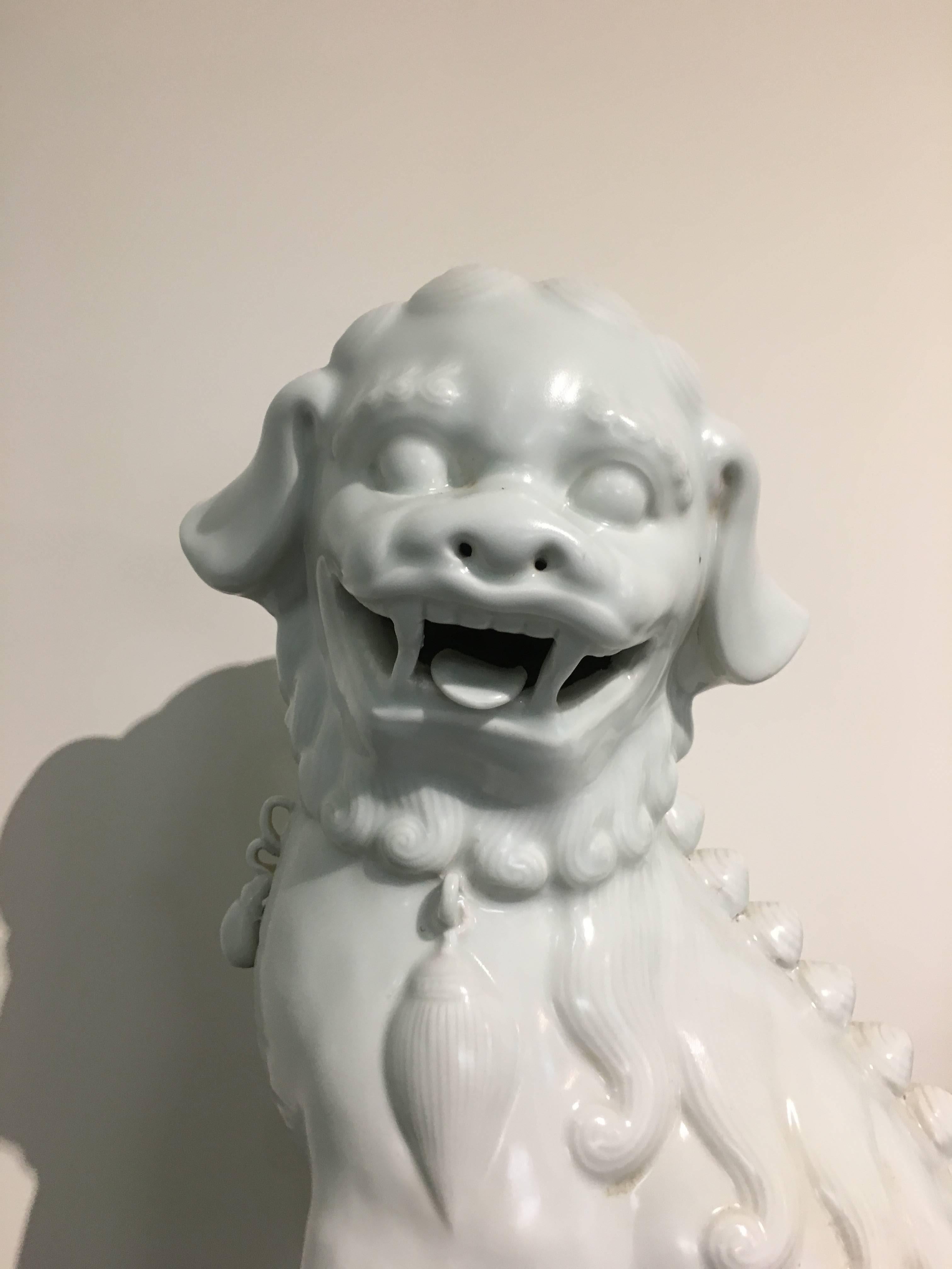 Large Pair of Chinese Mid-Century White Glazed Foo Dogs In Good Condition In Austin, TX