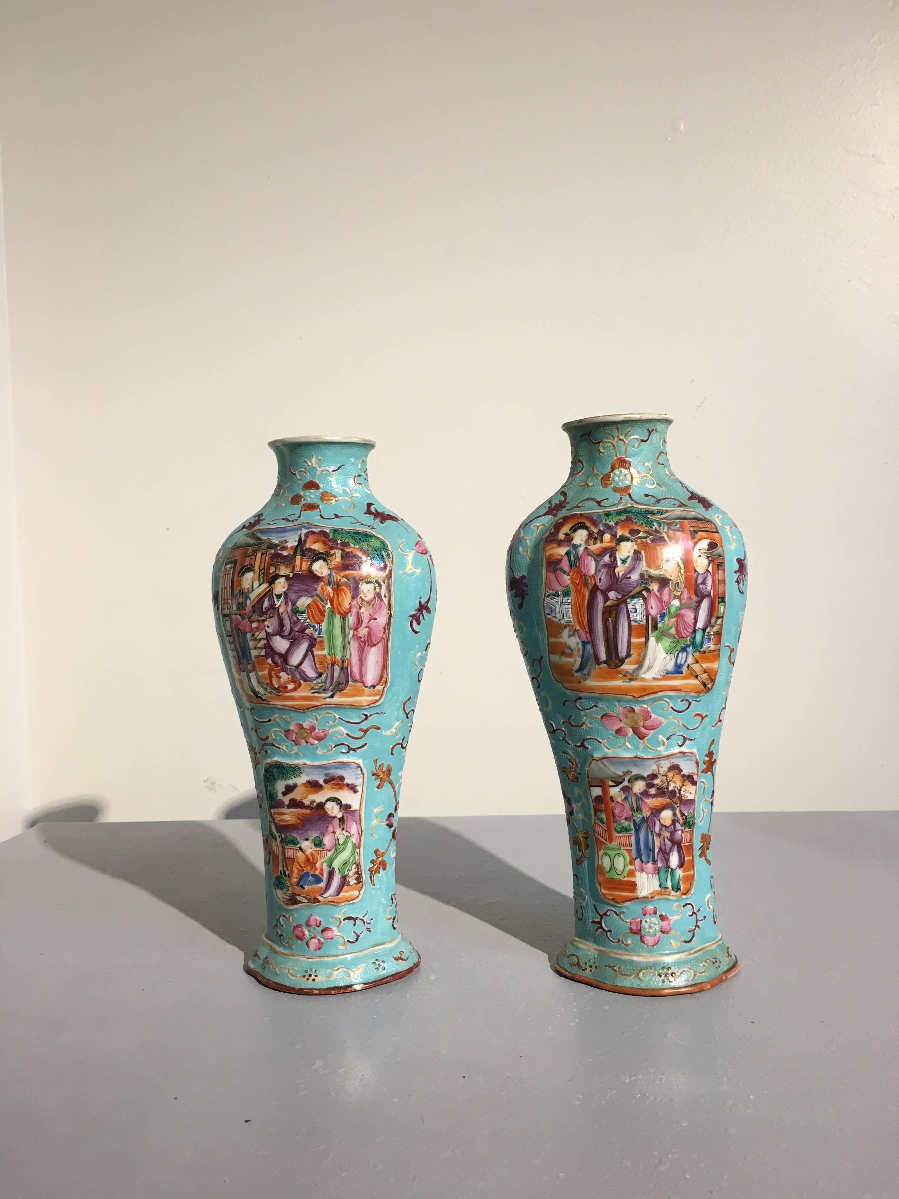 A fine pair of Chinese export quatrefoil vases decorated in the Mandarin palette upon an attractive turquoise 