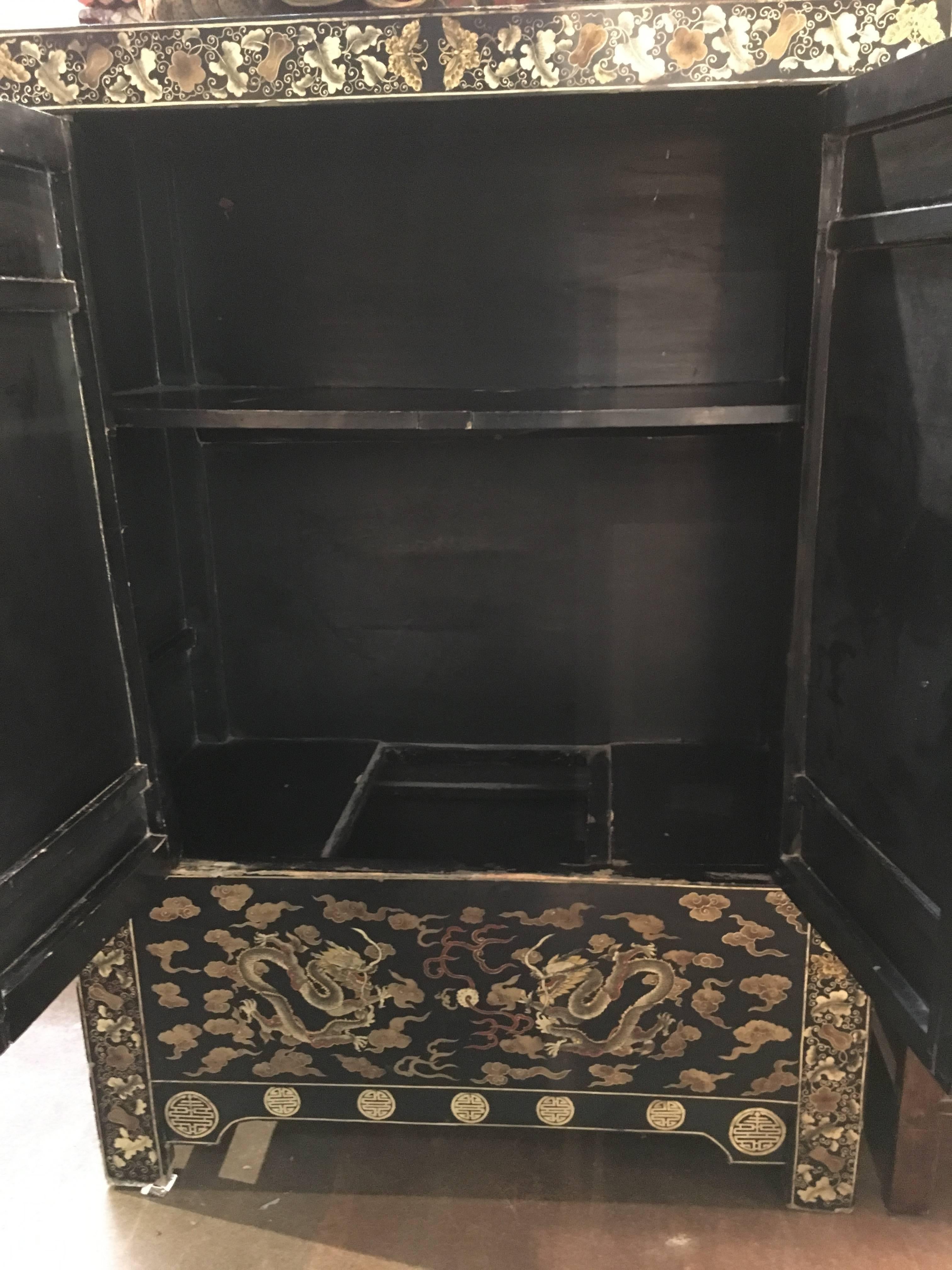 Chinese Black Lacquer Gilt Painted Dragon Cabinet, Late Qing Dynasty 1