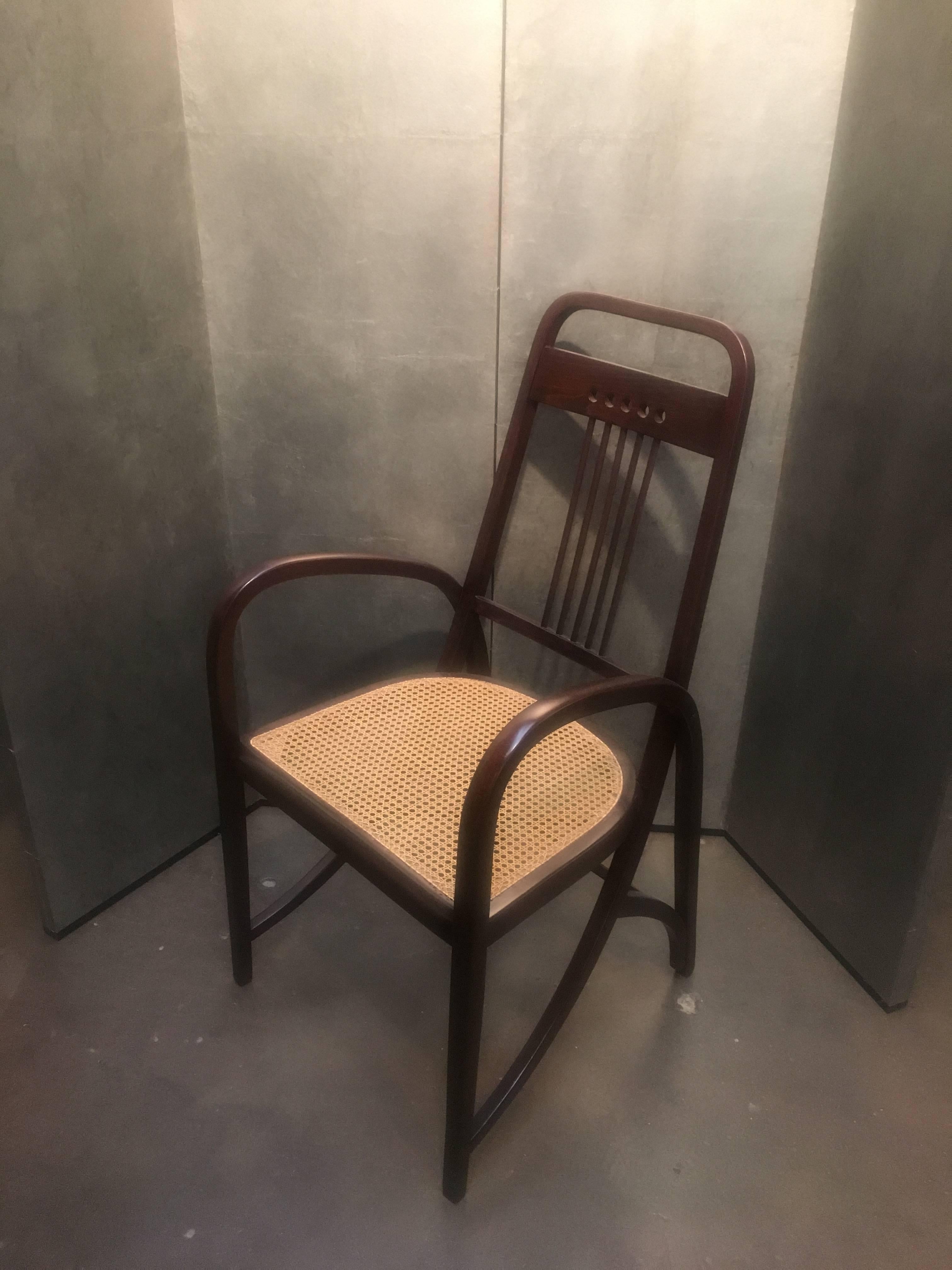 An iconic armchair of the Vienna Secession movement, the Thonet model no. 511 bent beechwood armchair, featuring stunning lines and beautiful proportions. A design tour de force, it is both simple and complex, with the legs and arms crafted from a