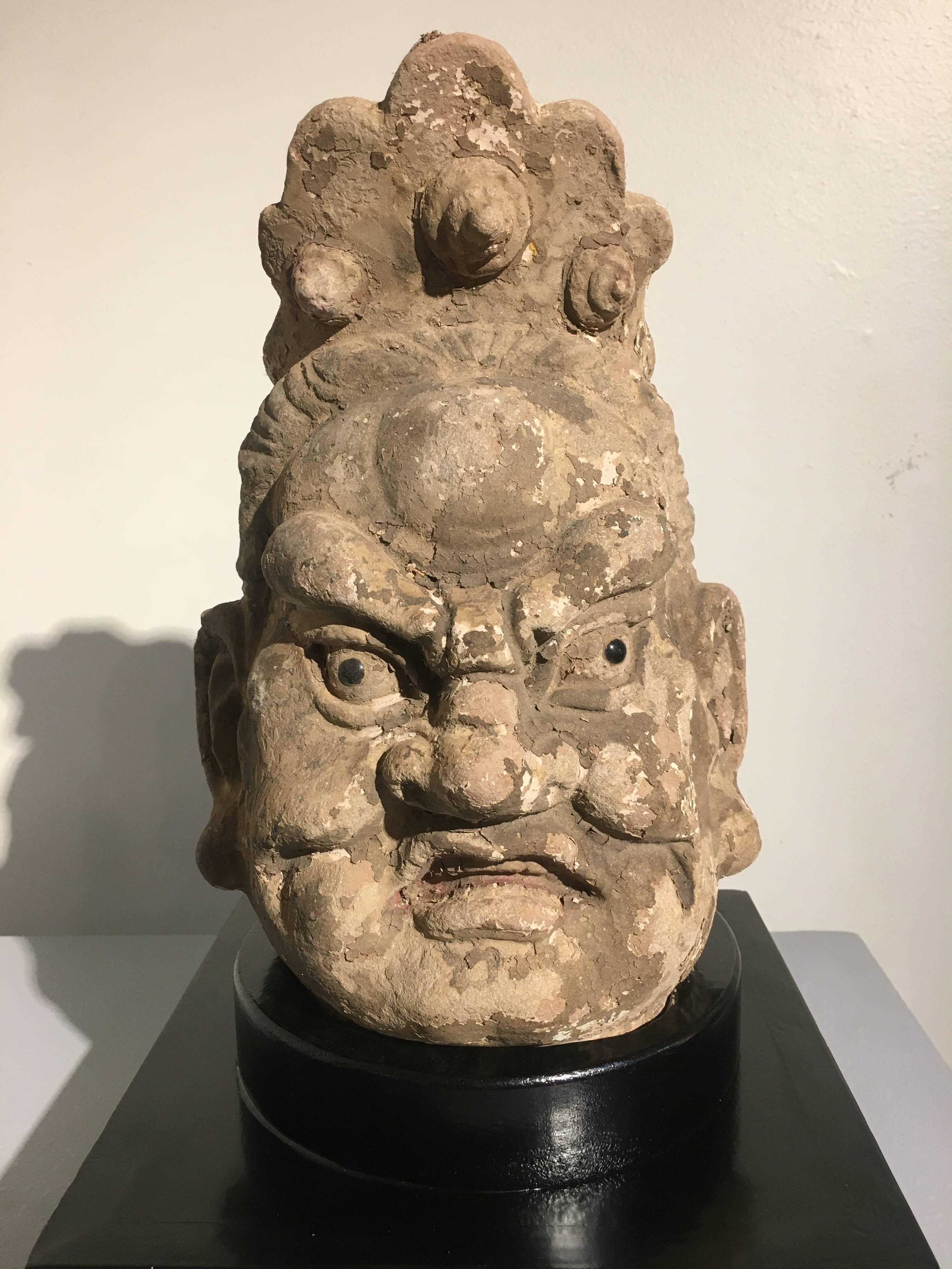 18th Century and Earlier Pair Chinese Stucco Dvarapala Guardian Heads, Yuan to Ming Dynasty, 14th Century