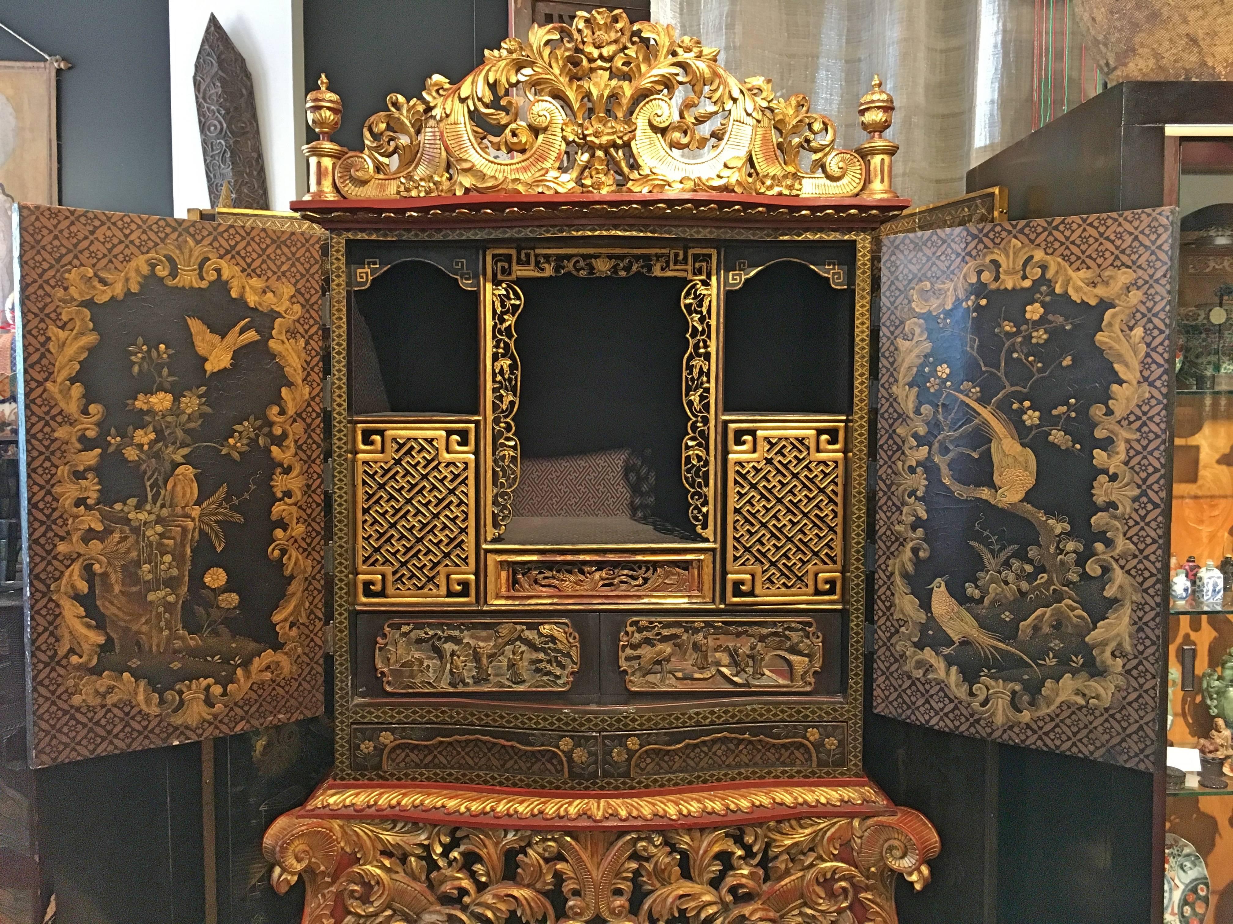 South American Japonisme Black Lacquer and Gilt Decorated Cabinet on Carved Gilt Stand
