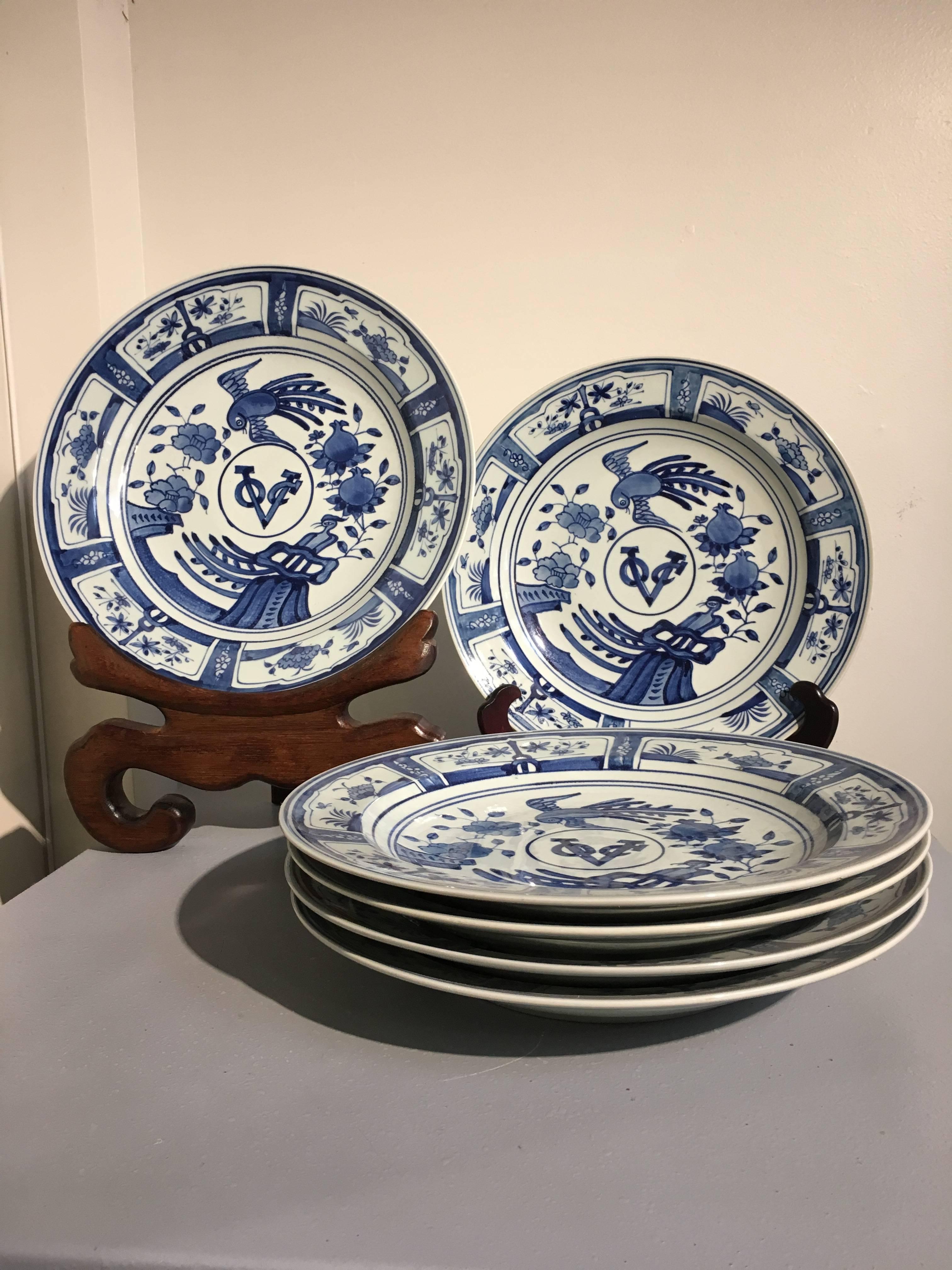 Six Japanese export style blue and white porcelain chargers, 20th century, China or Japan.

The blue and white porcelain chargers decorated in the kraak style, and emblazoned with the VOC logo for the Dutch East India Trade Company (Vereenigde