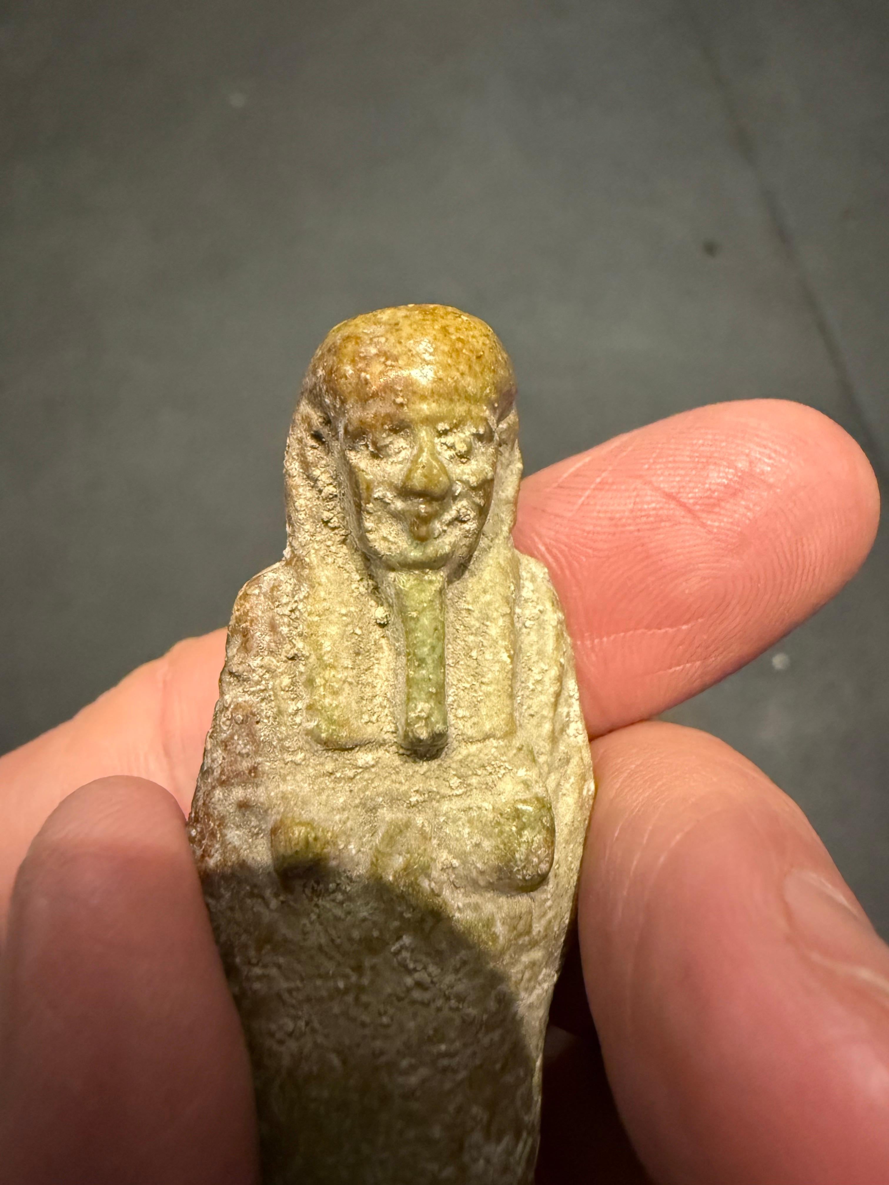 Stone A modelled pale turquoise glazed Ushabti, Ex Sotheby's For Sale