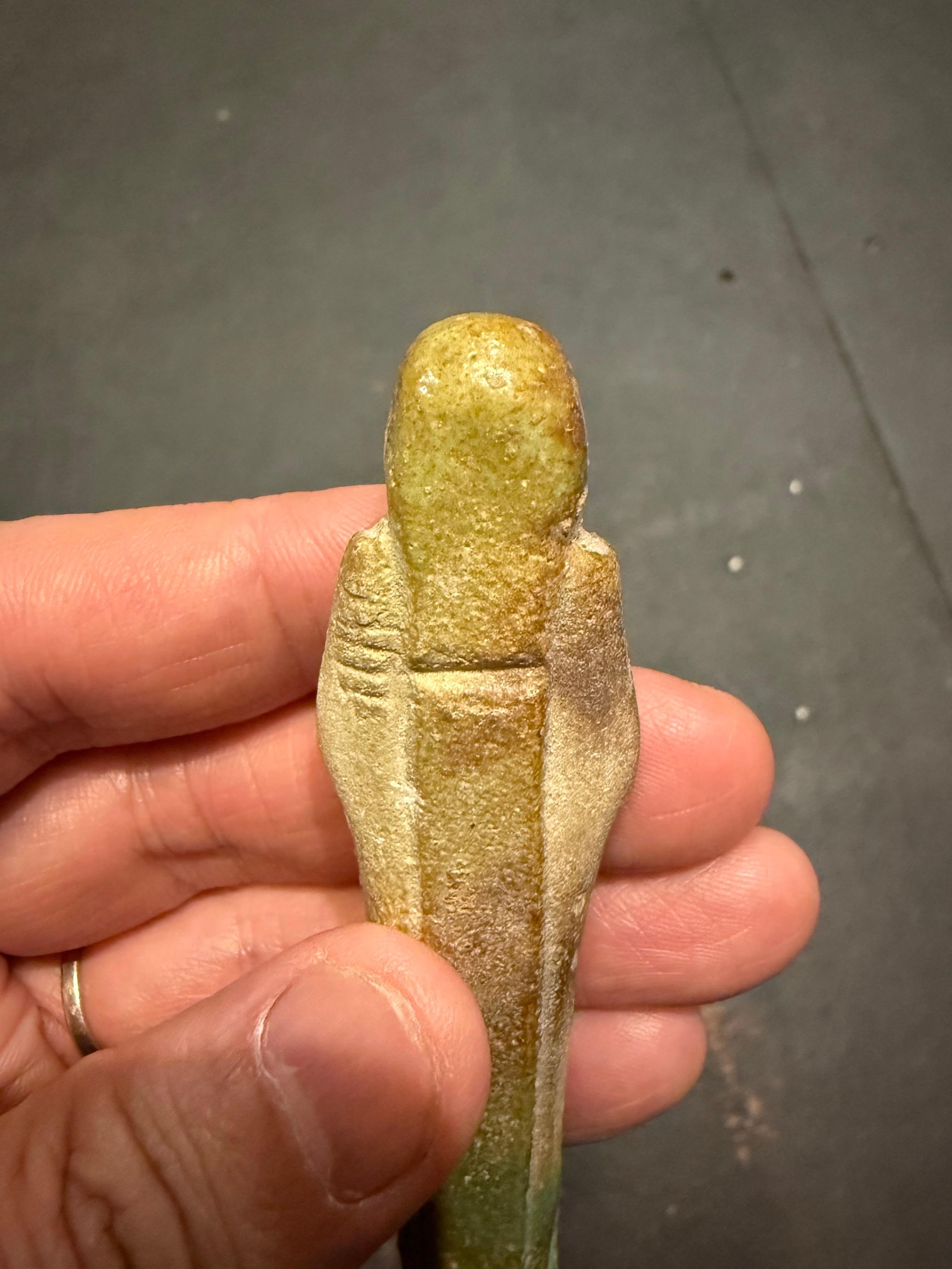 A modelled pale turquoise glazed Ushabti, Ex Sotheby's For Sale 2