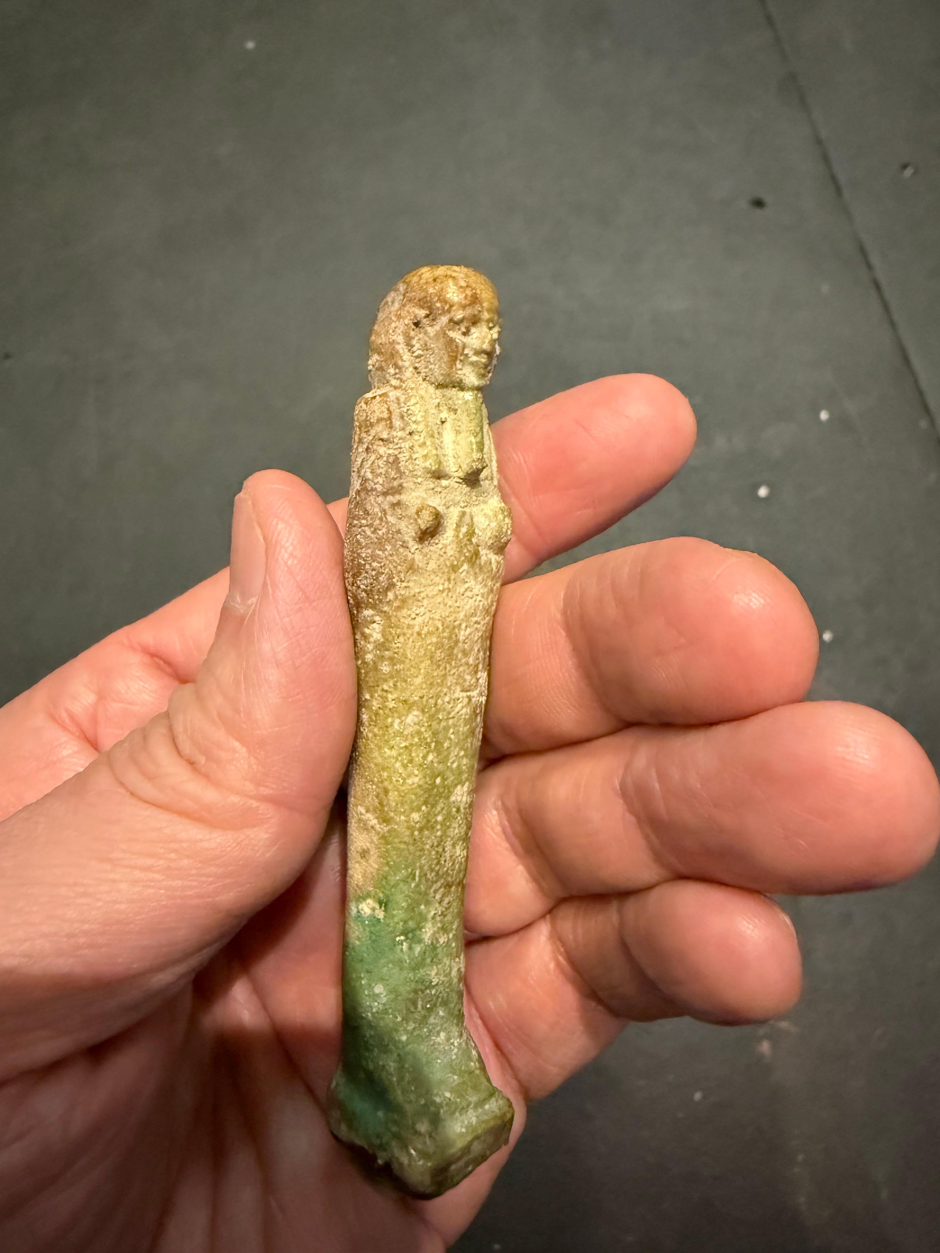 A modelled pale turquoise glazed Ushabti, Ex Sotheby's For Sale 6