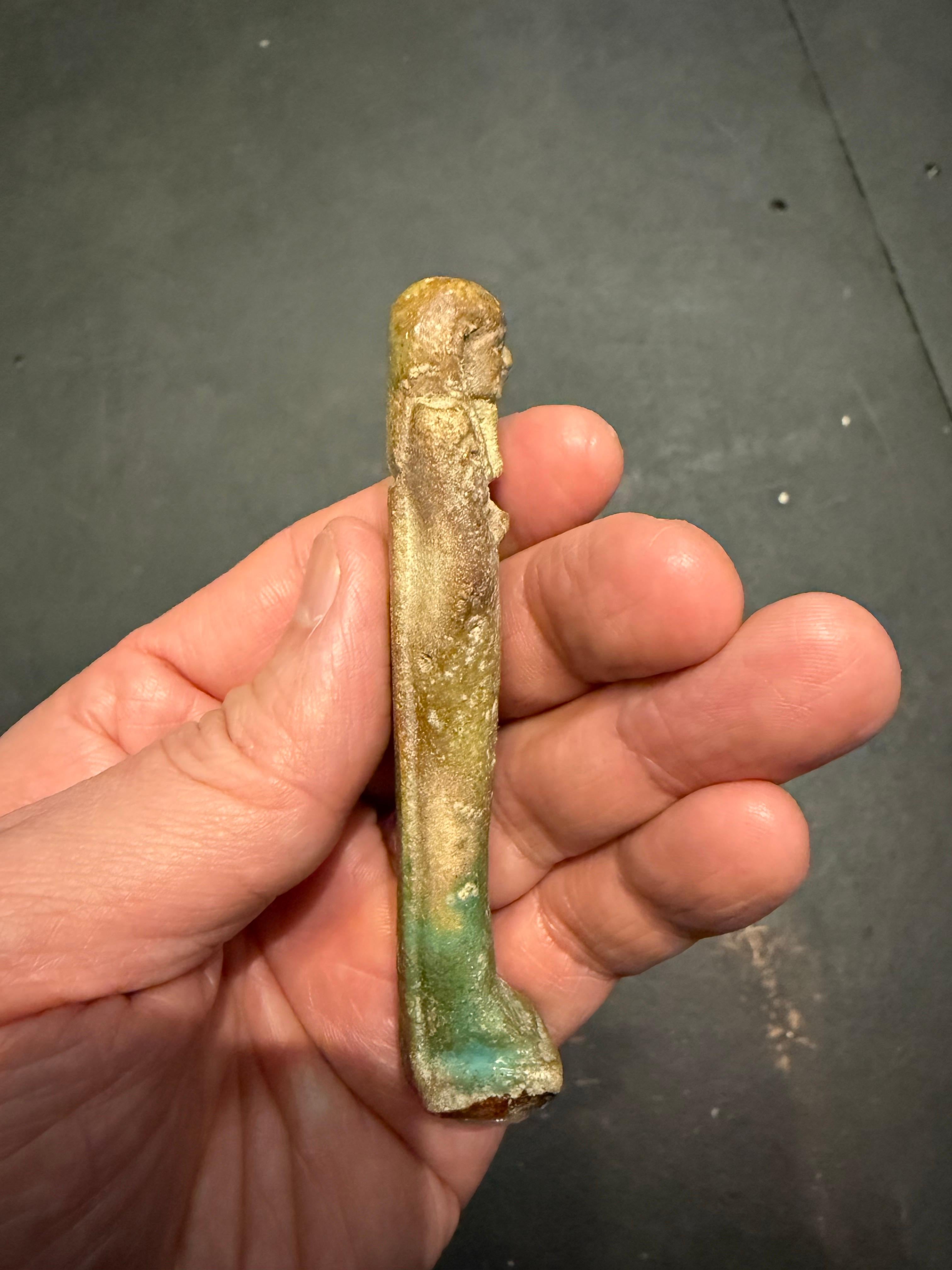 A modelled pale turquoise glazed Ushabti, Ex Sotheby's For Sale 7