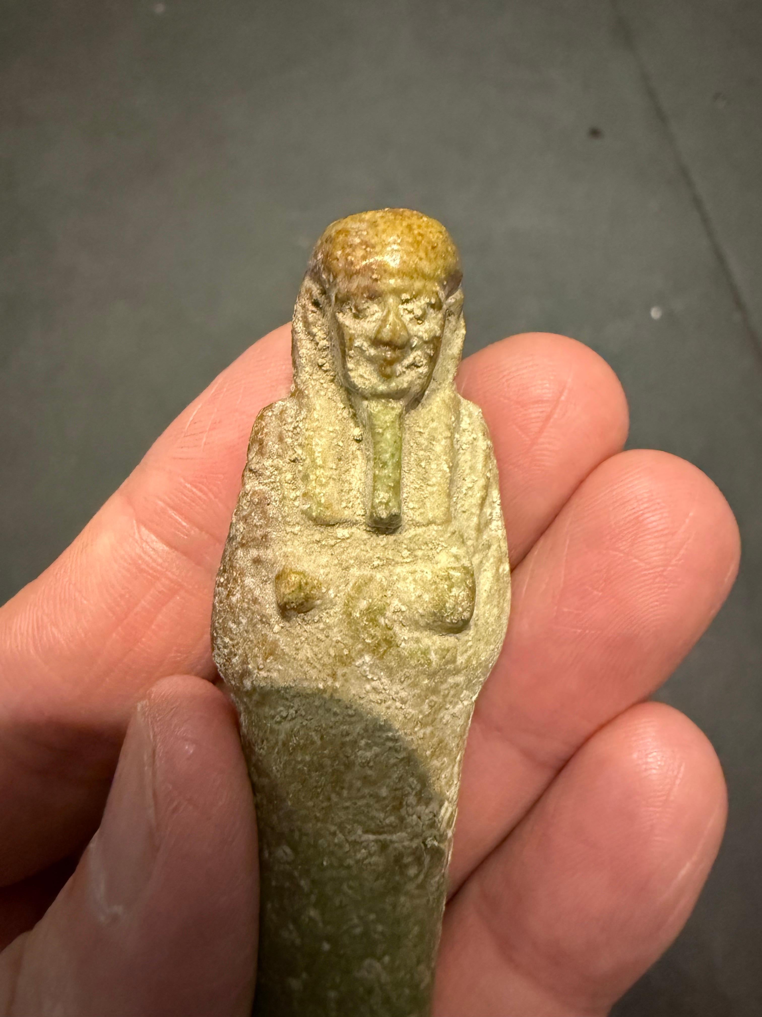 A modelled pale turquoise glazed Ushabti, Ex Sotheby's For Sale 8