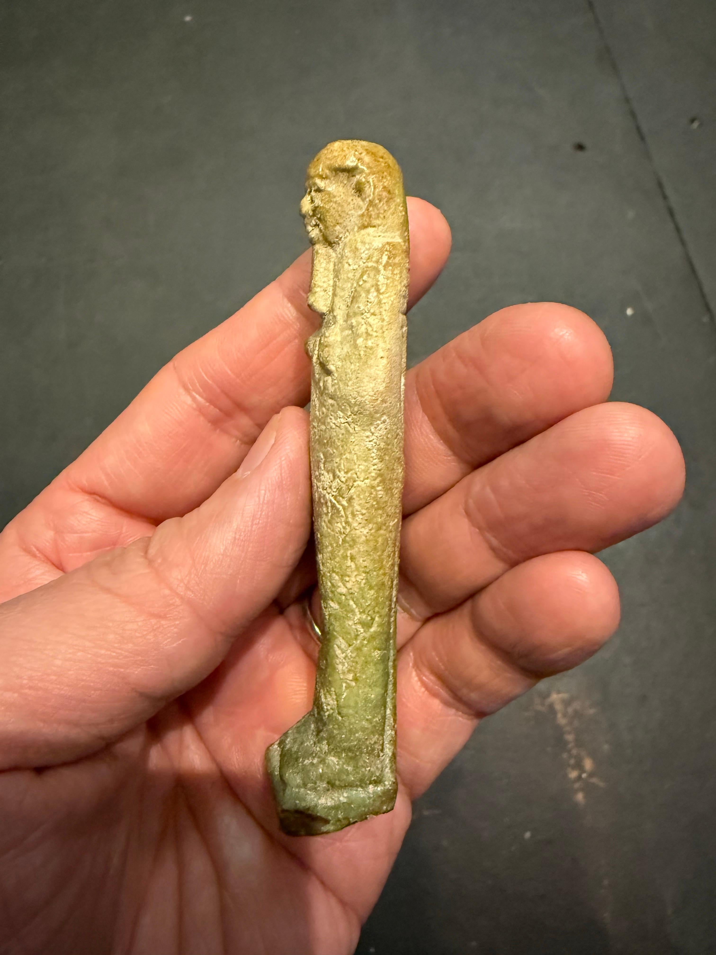 A modelled pale turquoise glazed Ushabti, Ex Sotheby's For Sale 10