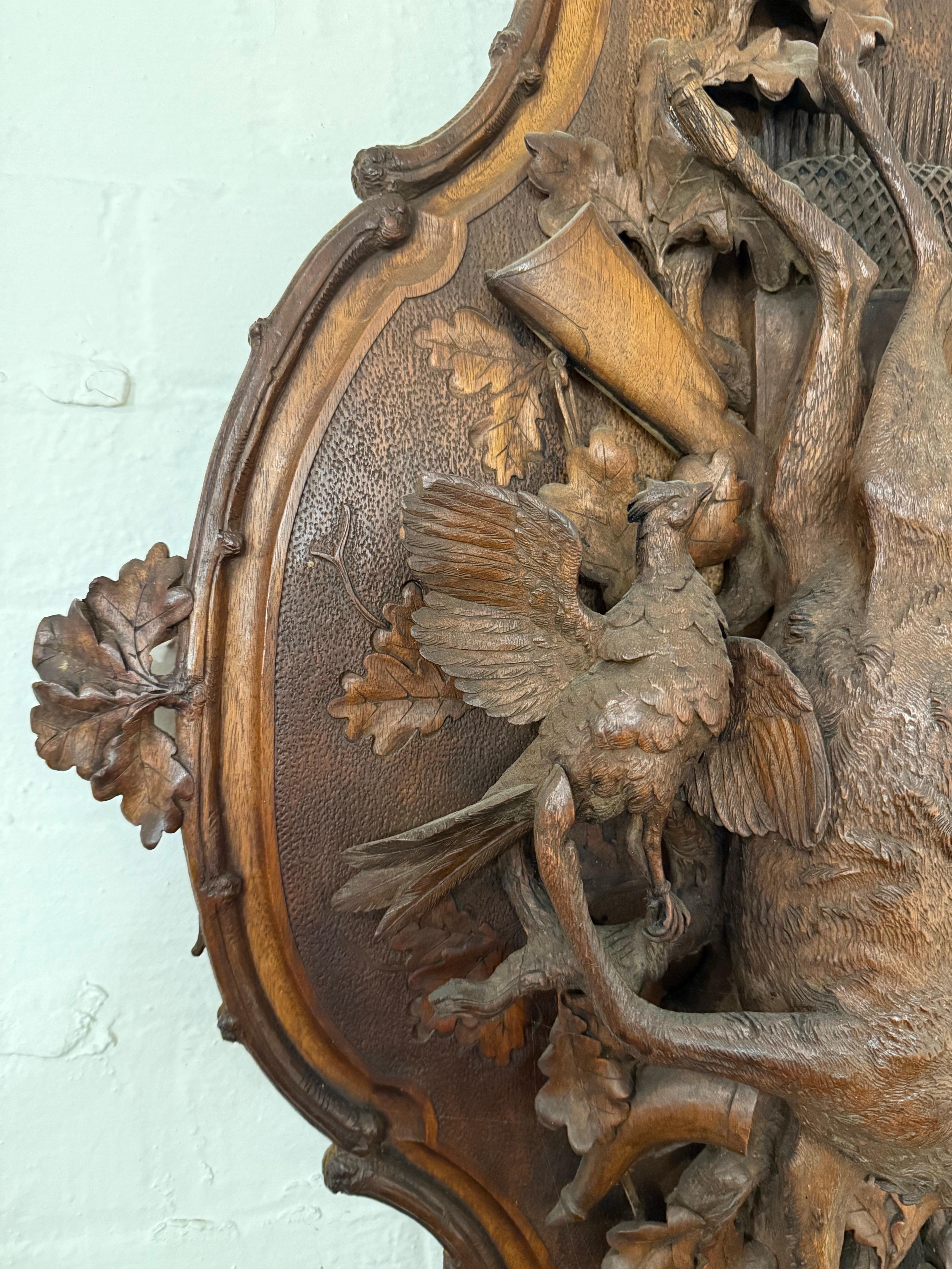 A Swiss Carved Black Forest Hunting Wall Plaque, Early 20th Century For Sale 3