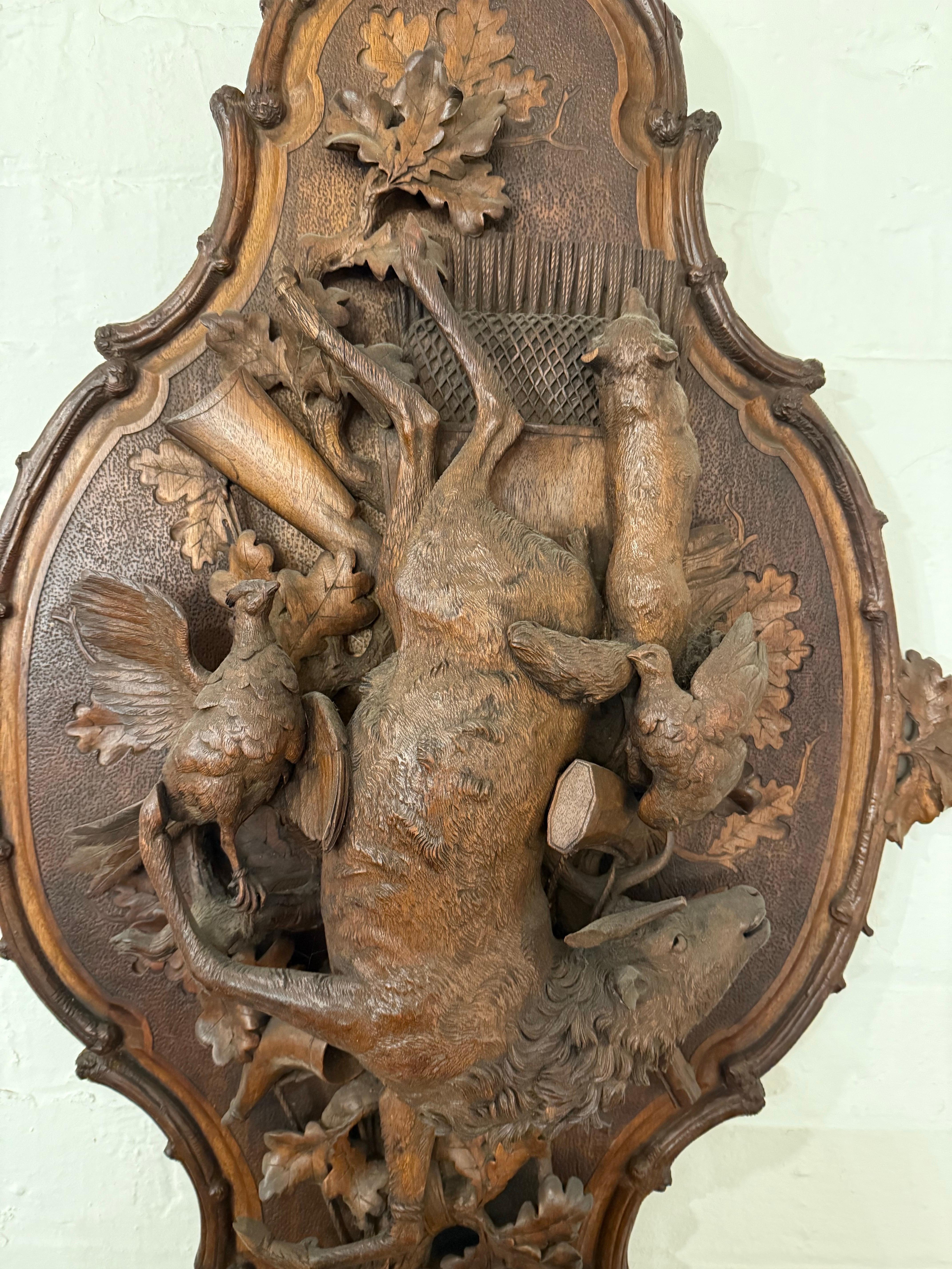 A Swiss Carved Black Forest Hunting Wall Plaque, Early 20th Century For Sale 5