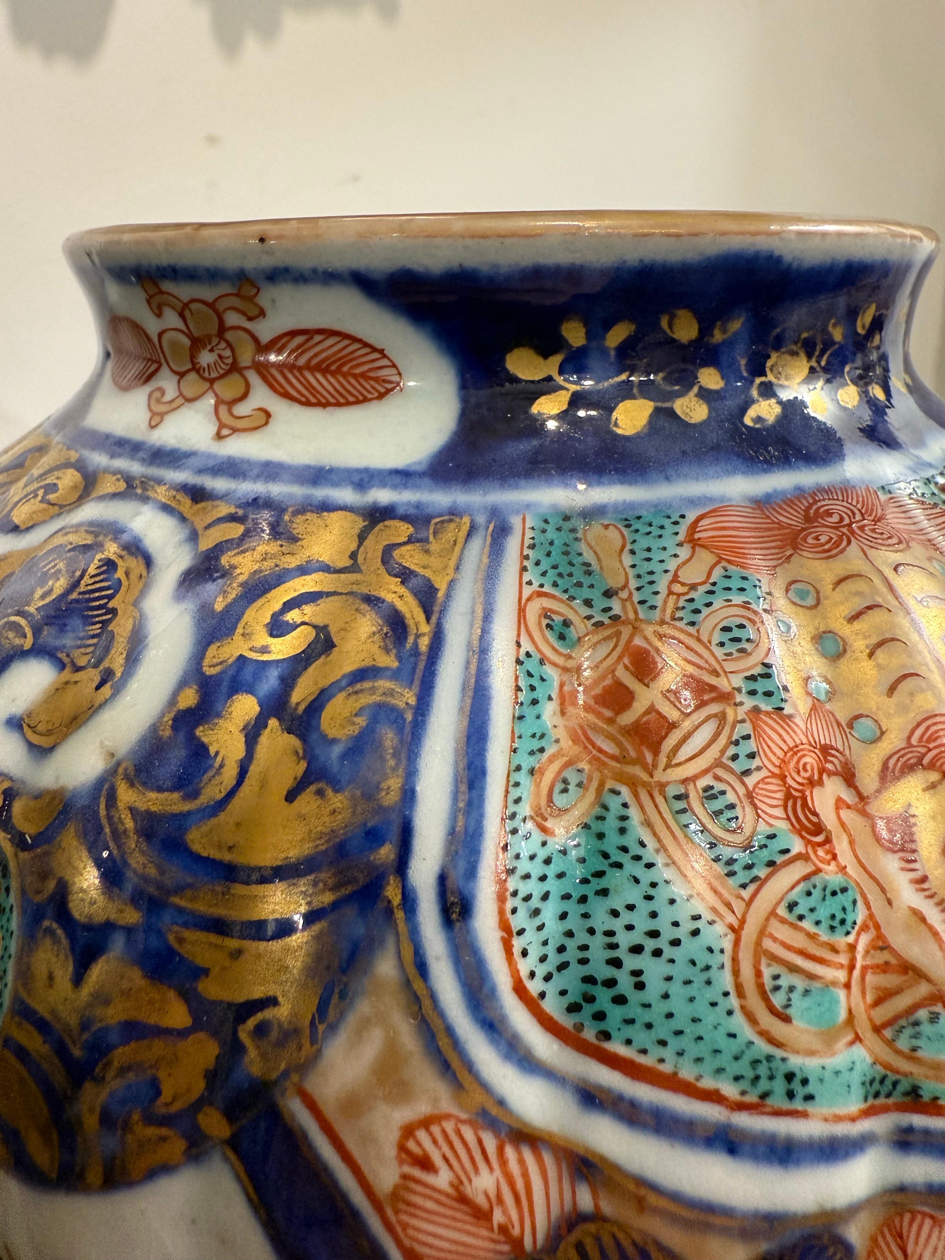 Hand-Crafted A Japanese Fluted Imari Vase with Mark and Metal Cover, 19th Century For Sale