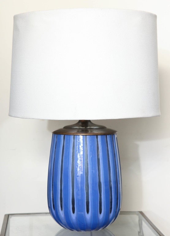 Unusual color and texture. Etched Murano glass table lamps. Simple and elegant in design. Vibrant royal blue. 12.5 inches tall. 7 inches wide. Overall height is 22 inches tall. Three-way 150 watt or LED ready.Reduced from 2900.00 to 1900.00