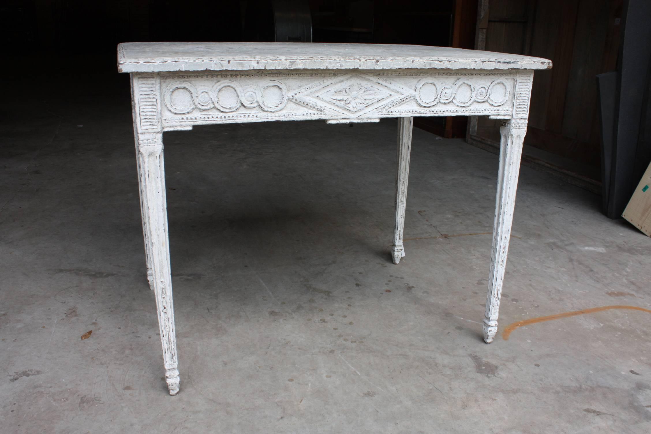 A Louis XVI painted off-white game table with faux painted marble-top, it would make a perfect side table.