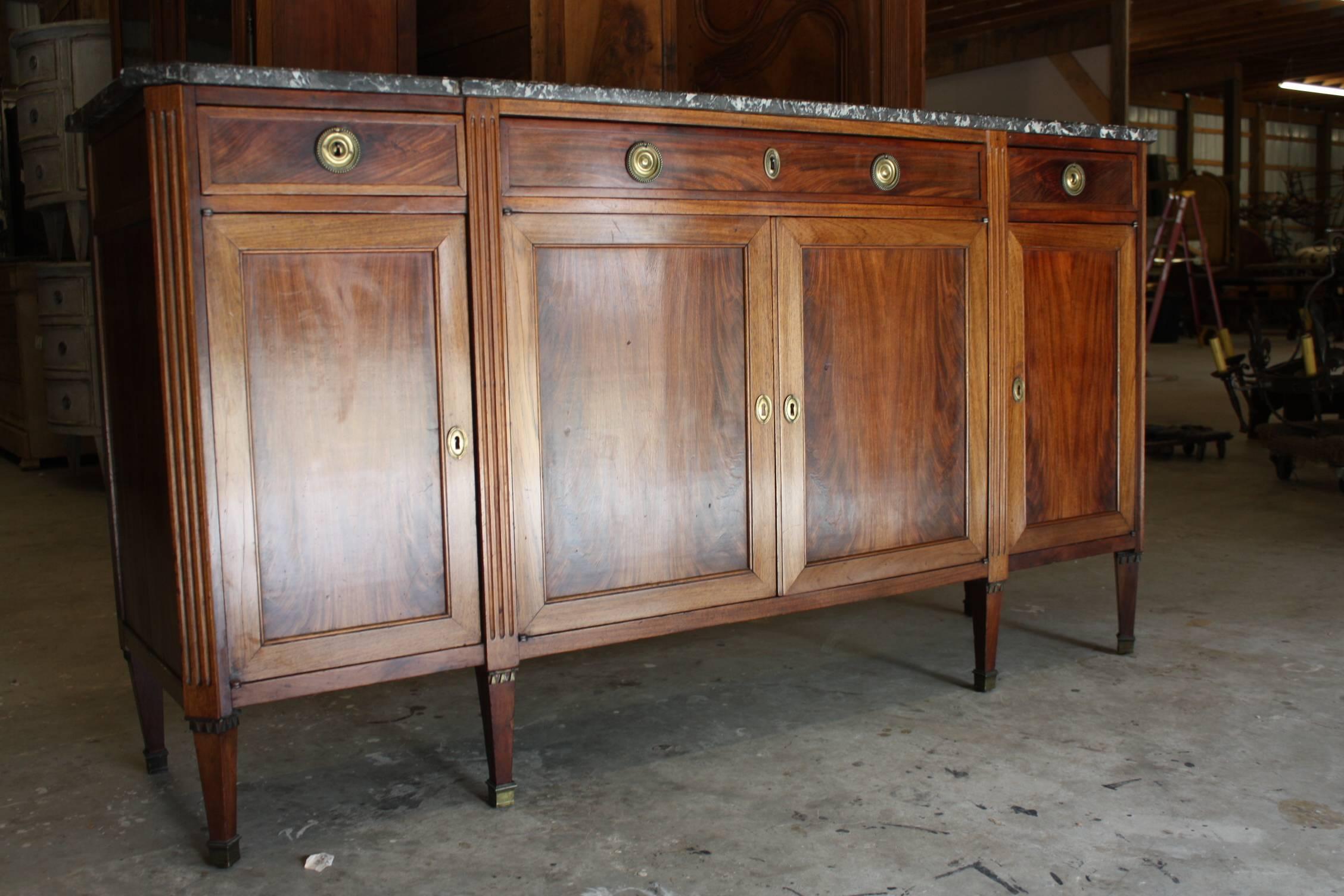 Antique fruitwood enfilade with original marble top from France, circa 1880. Flanked with three drawers on top, a double door and two side doors on both sides. Clean lines with beautiful patina and great storage.