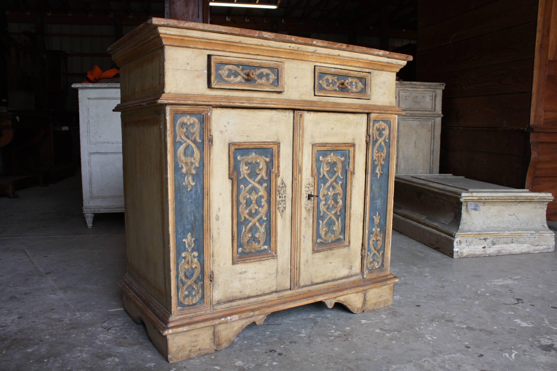 Beautifully painted Italian two-door cabinet or buffet with faux marble painted top.