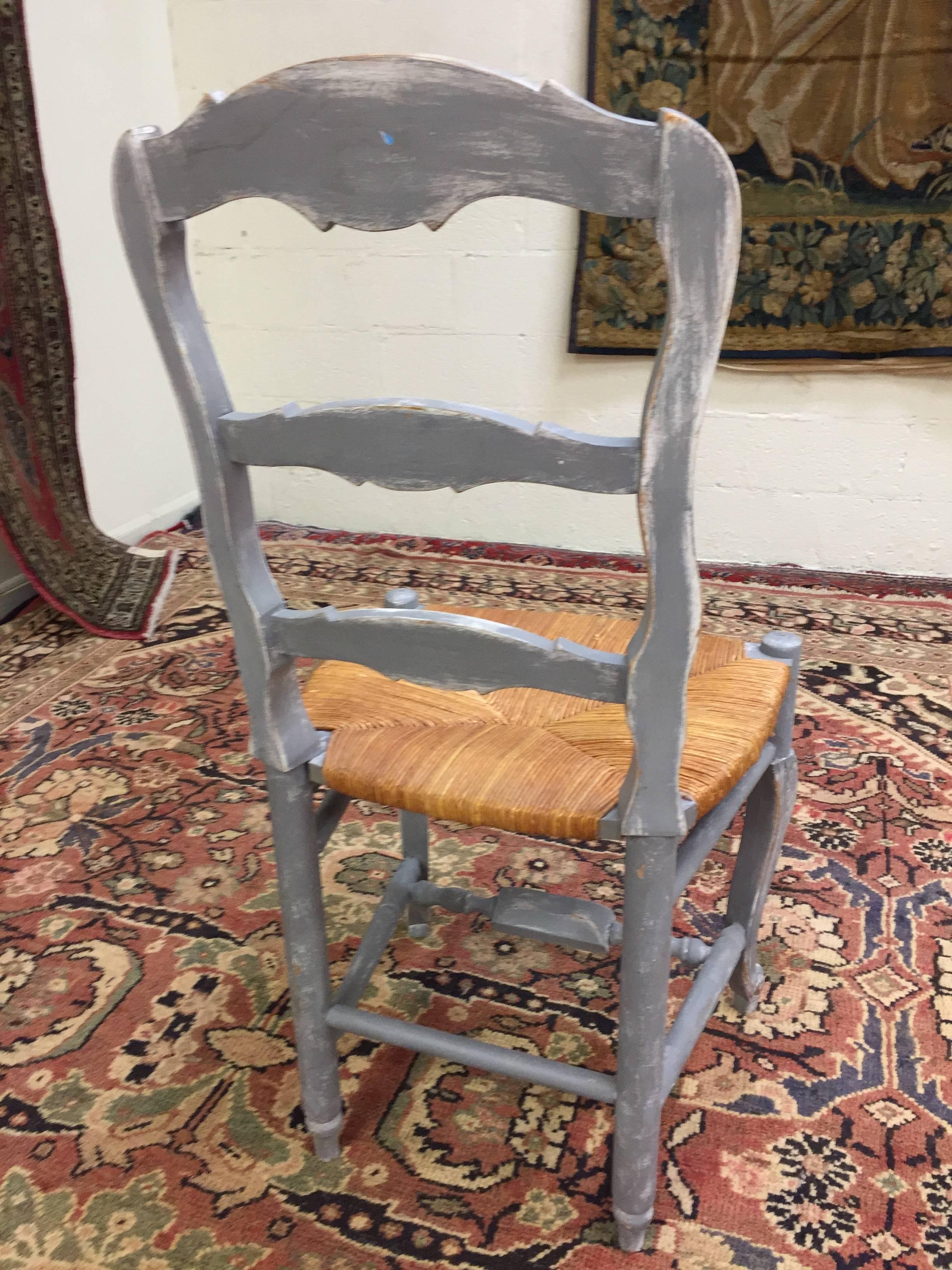 Set of six painted French Provençal chairs (gray in color with white undertones). From floor to top of the seat is 18.75 inches.