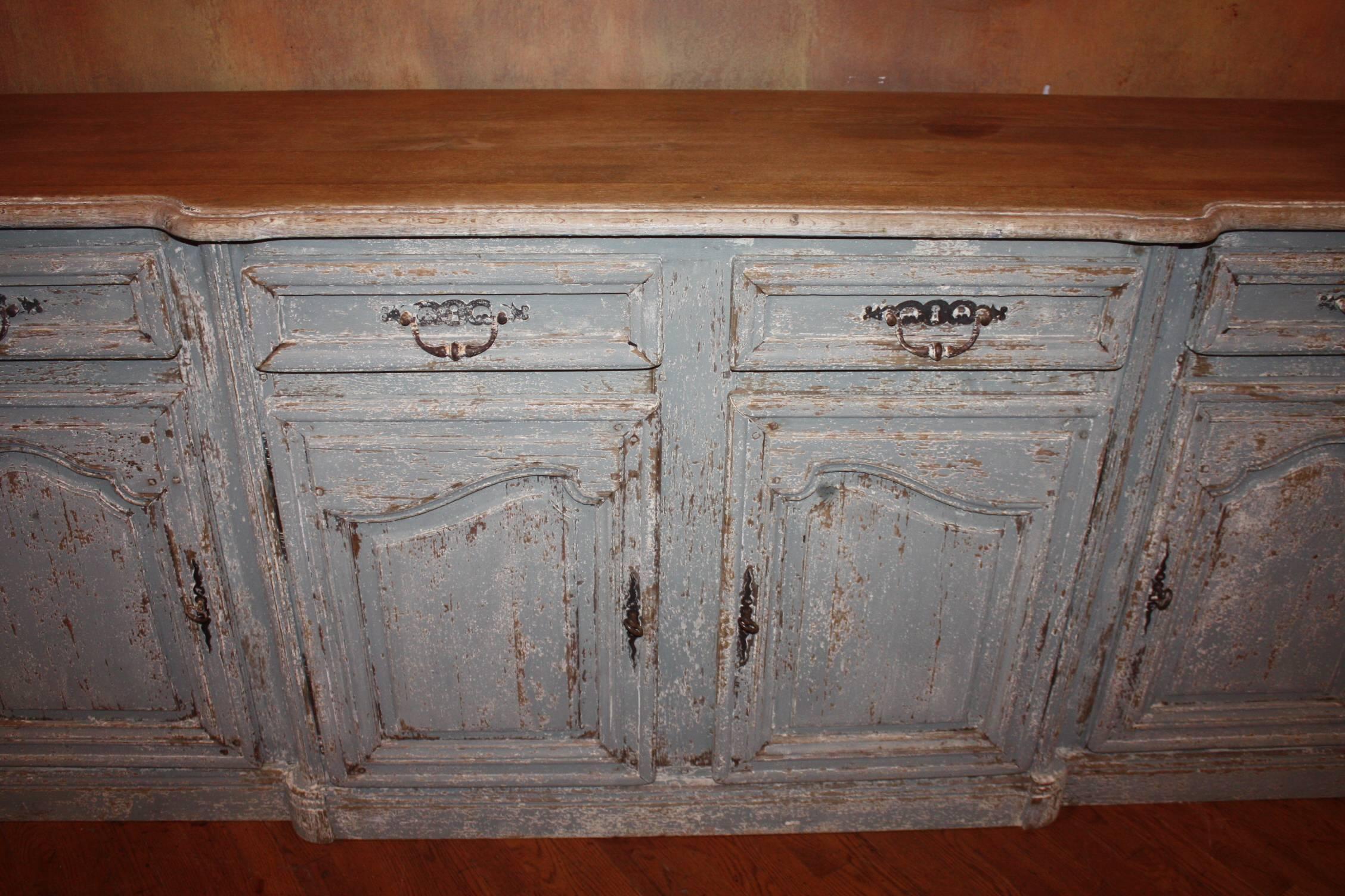 Beautifully painted four-door and four drawer painted enfilade with a bleached top.