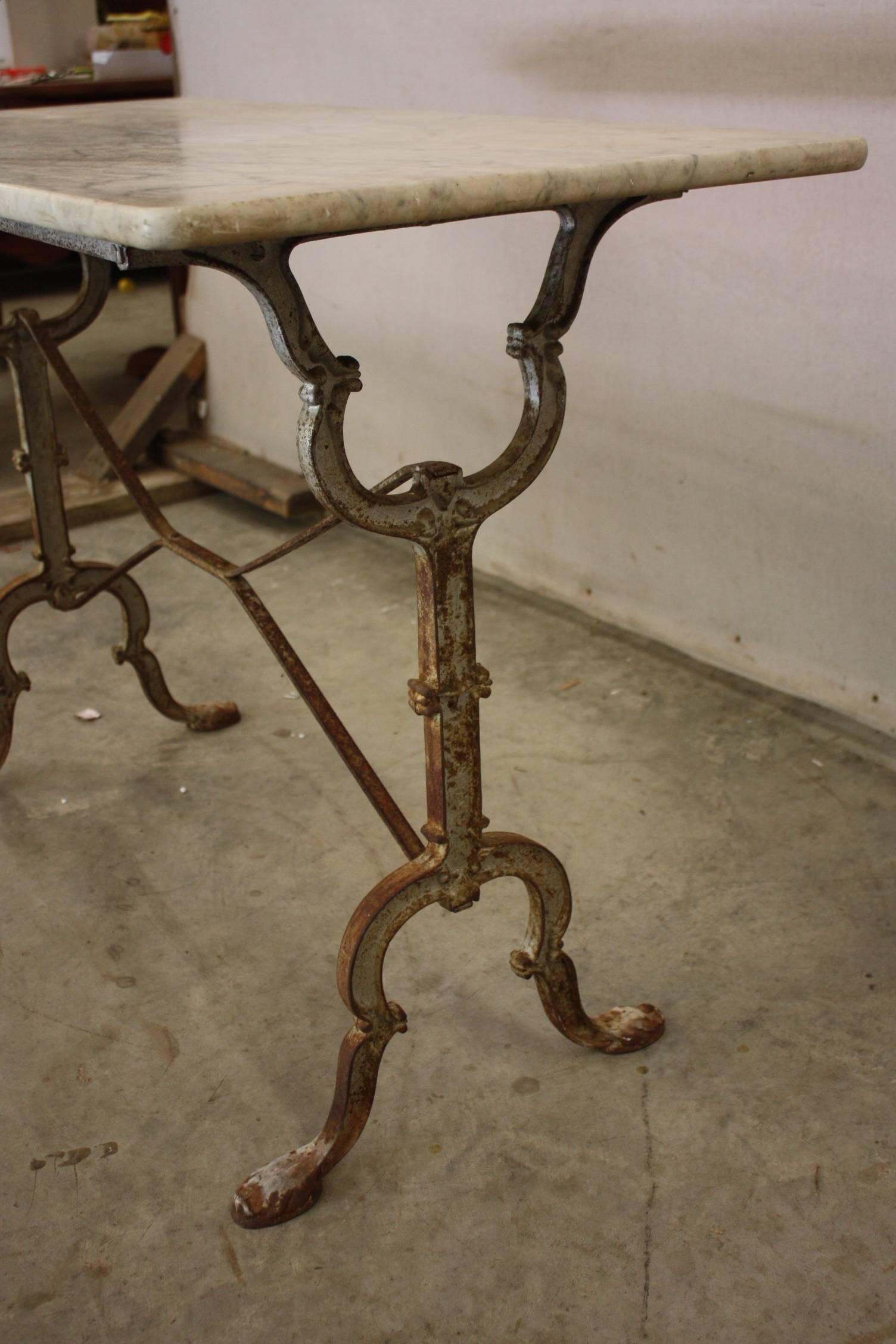 French cast iron bistro table with painted base and original marble-top.