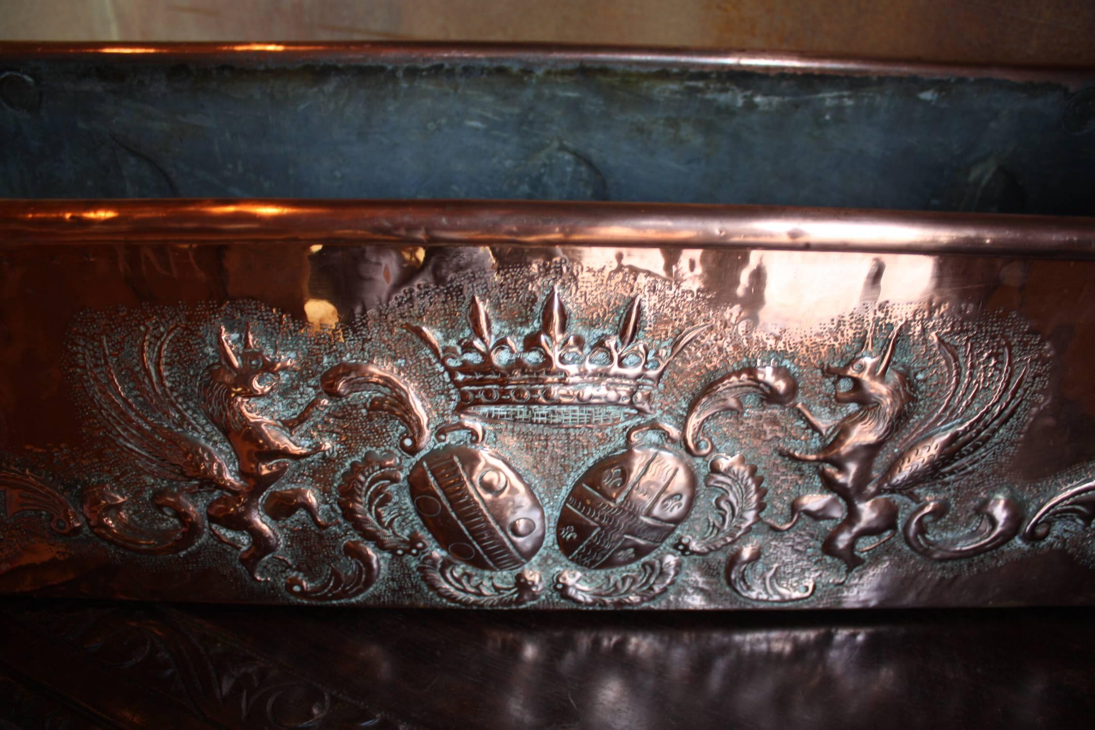 Beautiful large copper fish poacher that is embossed on both sides. Great for a centrepiece on a dining table and could even be used as a vase for flowers.

 