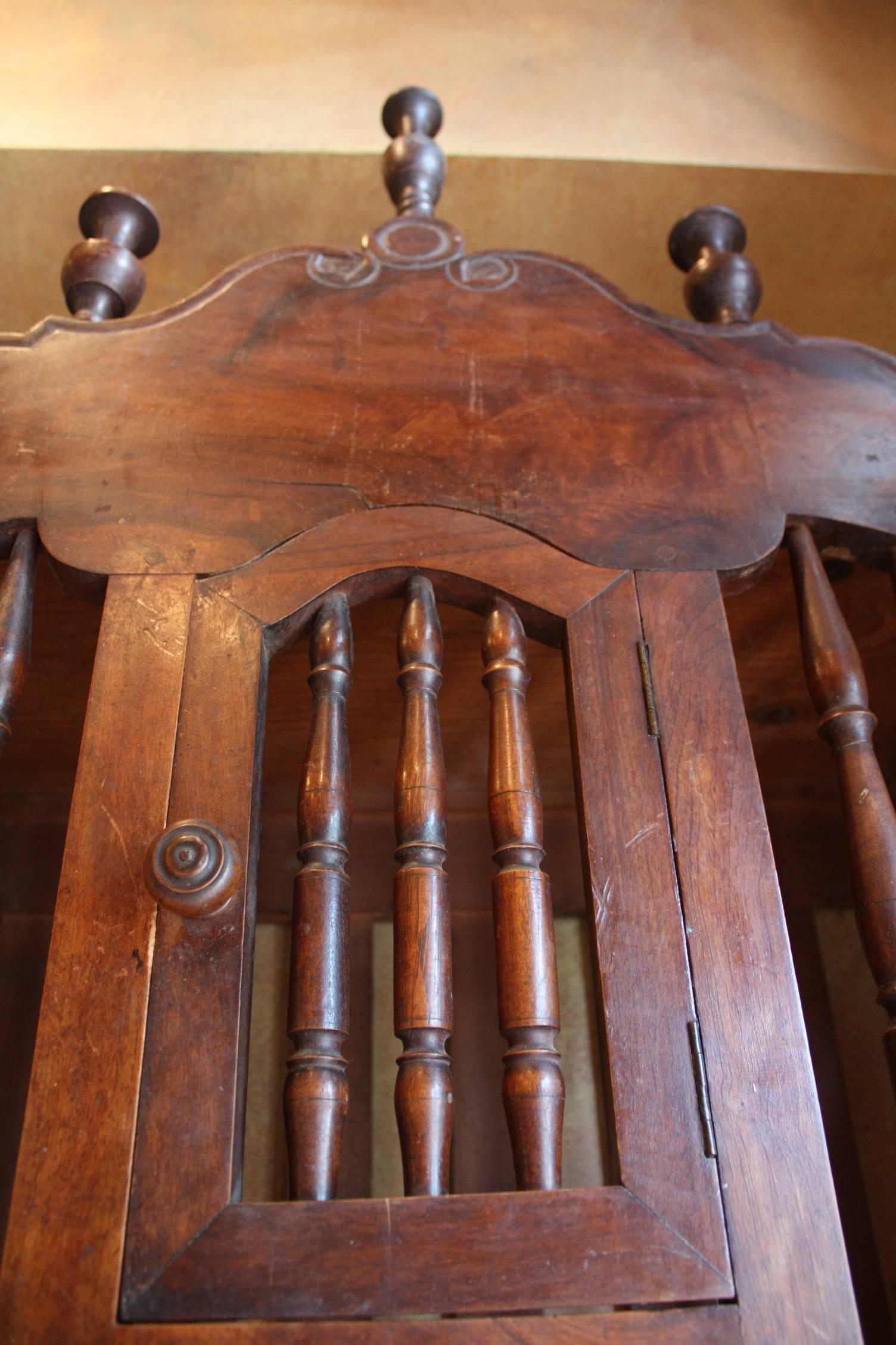 This 19th century hand-carved walnut panetie're from France. Originally used to store French baguettes or long loaves of bread, panetieres were meant to sit on a petrin (dough chest) but eventually grew into elaborate decorative pieces which hung on