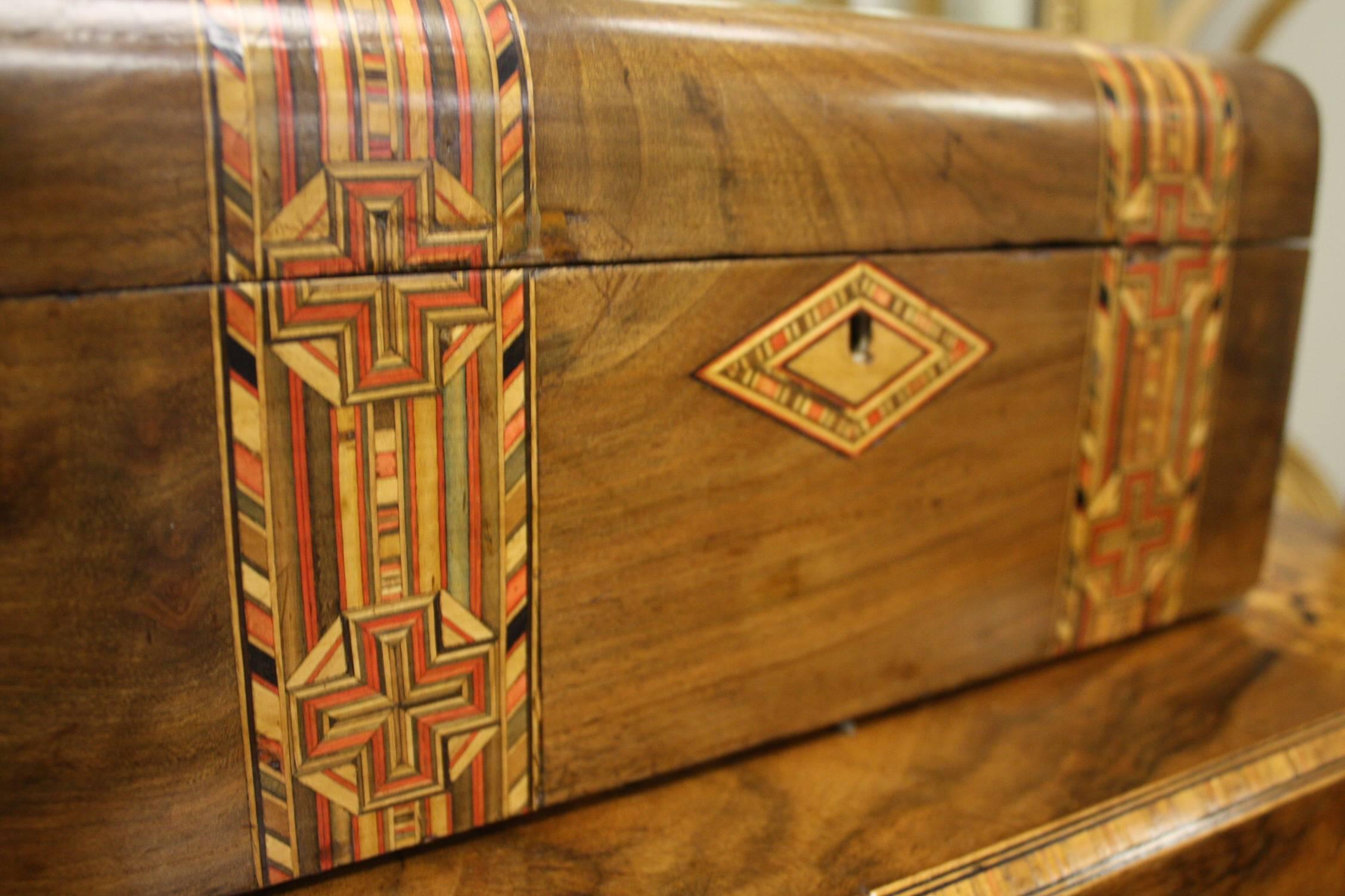 19th century English game box finely inlaid with satinwood, ebony woods.