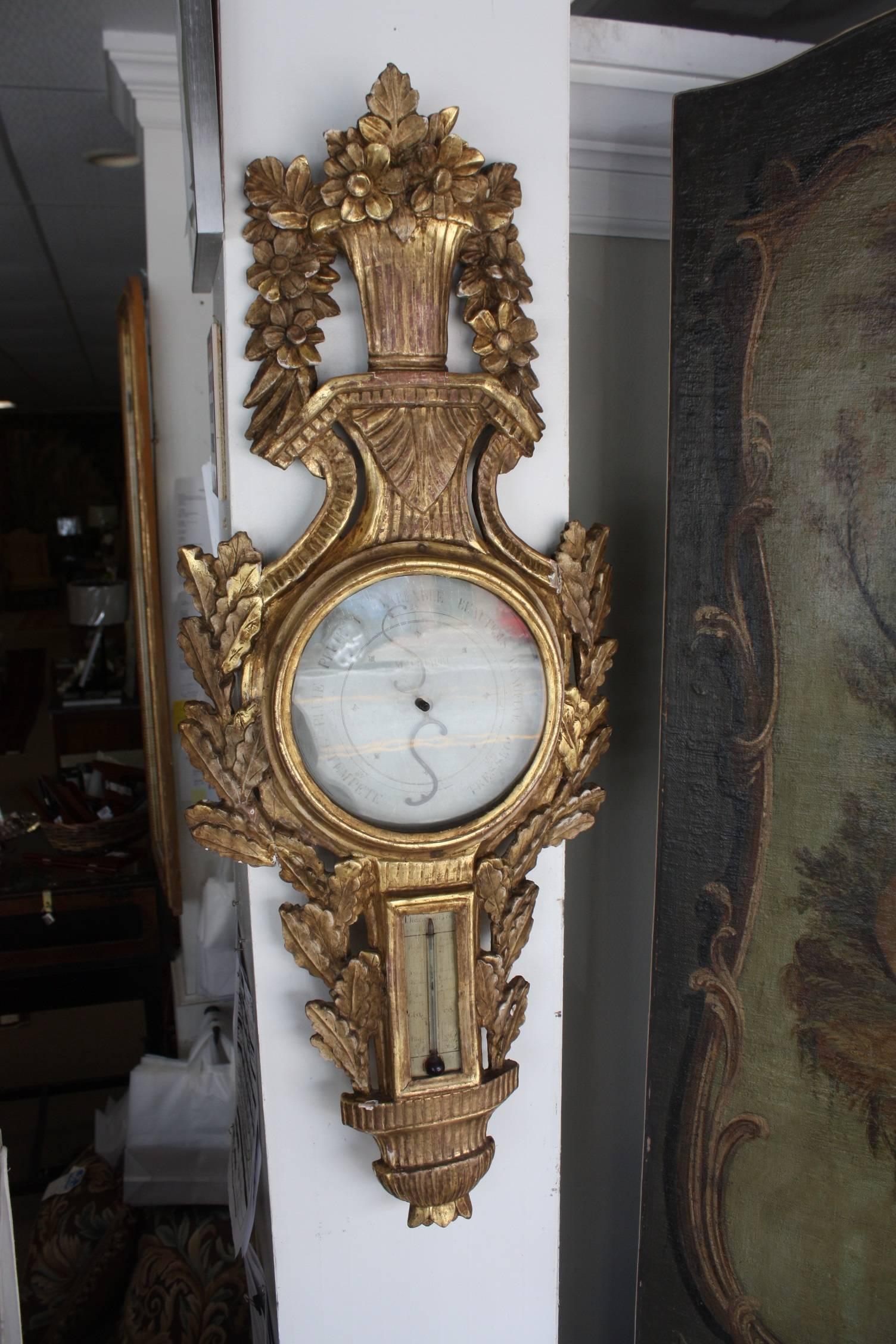 Louis XVI painted and giltwood barometer.
